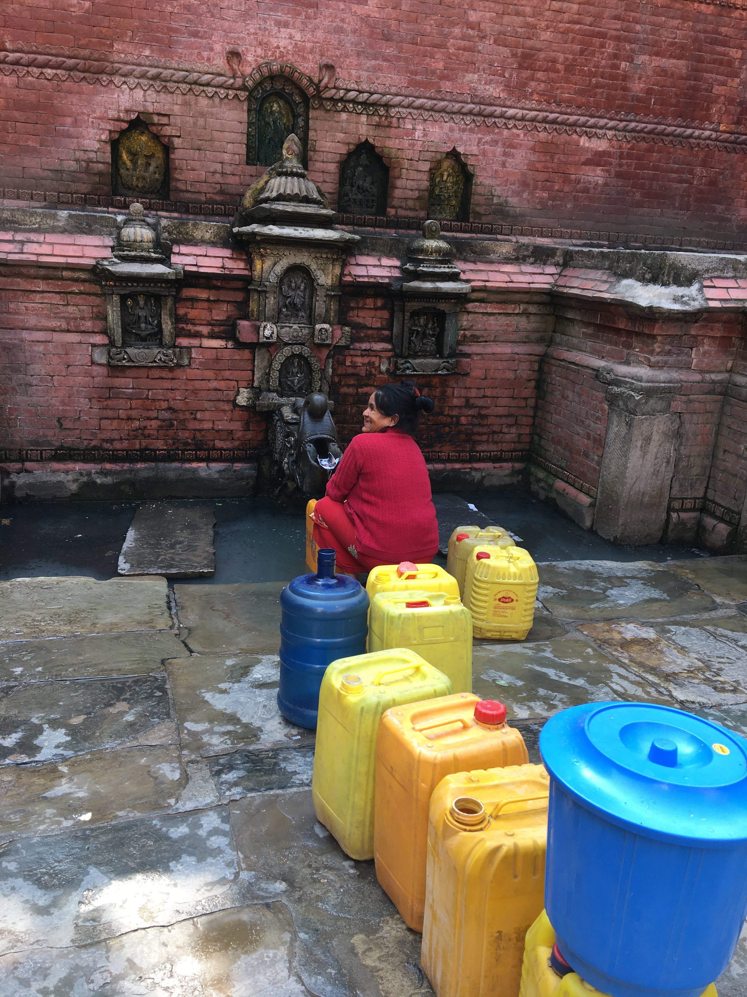  Plastic ‘Ghee gallons’ in queue at  Maru Hiti,  Kathmandu. 
