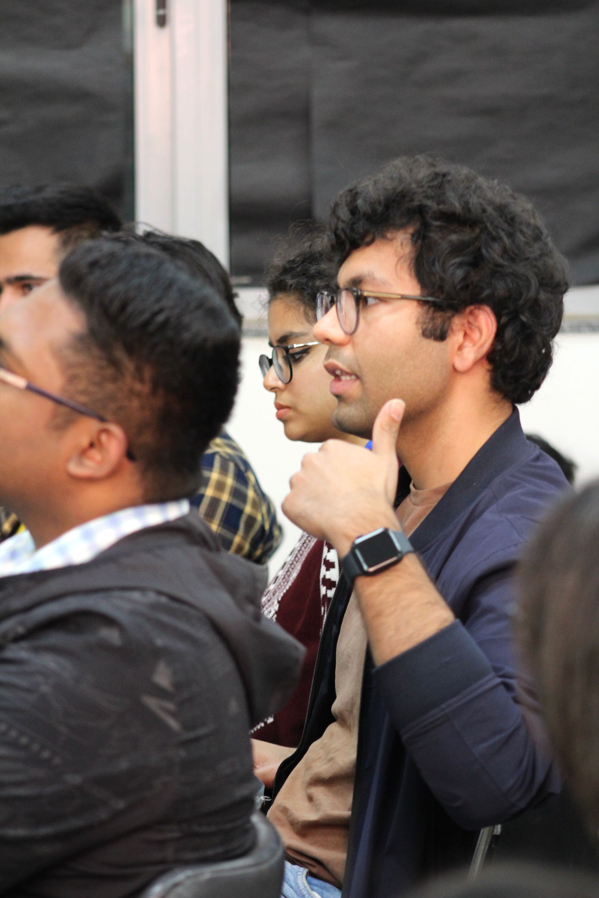 Students at South Asian University ask questions in Nihal Perera's talk.