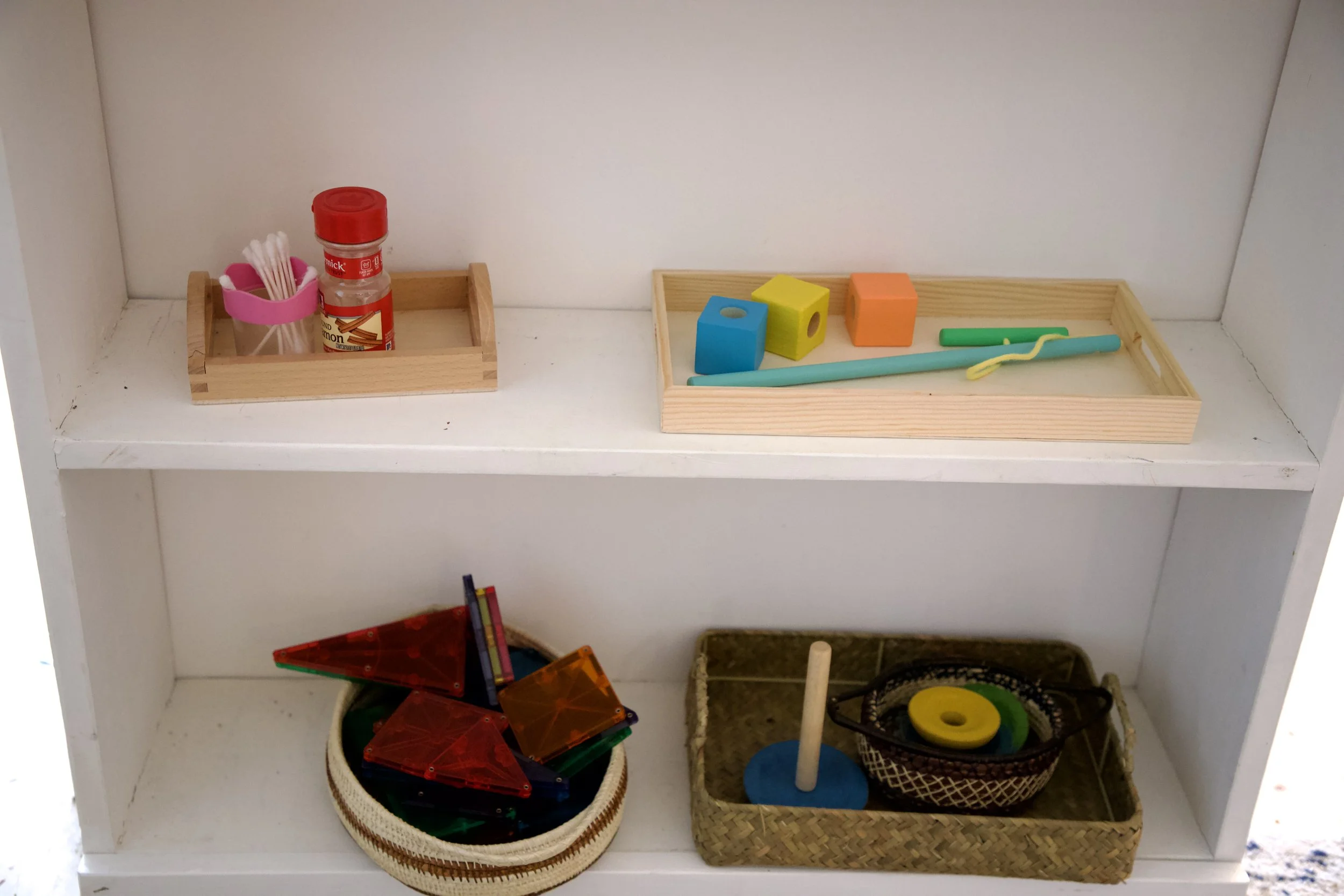 Our Montessori shelf for a 15 month old