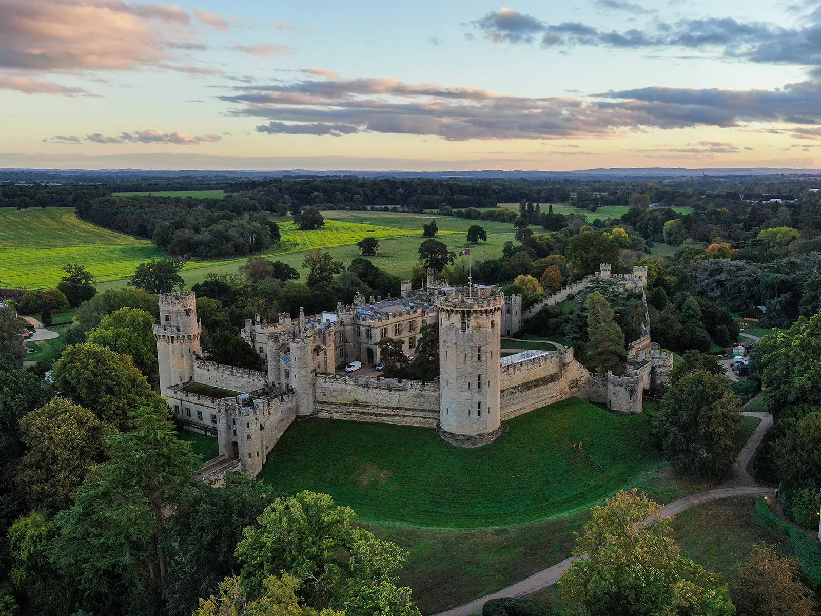 Aerial drone photograph of Warwick Castle during a joint 150th birthday celebration.