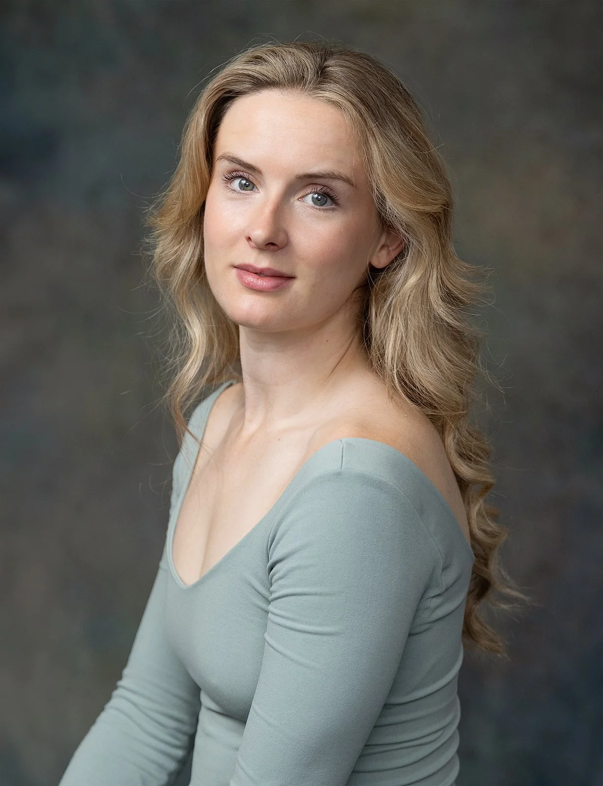 Professional studio headshot with natural lighting