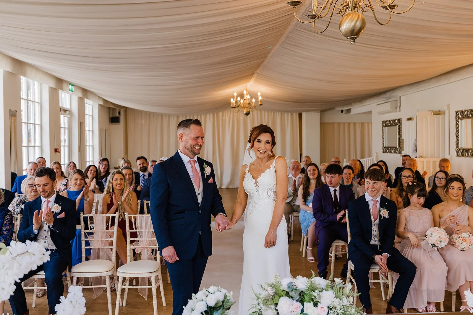 a bride and groom at warwick house