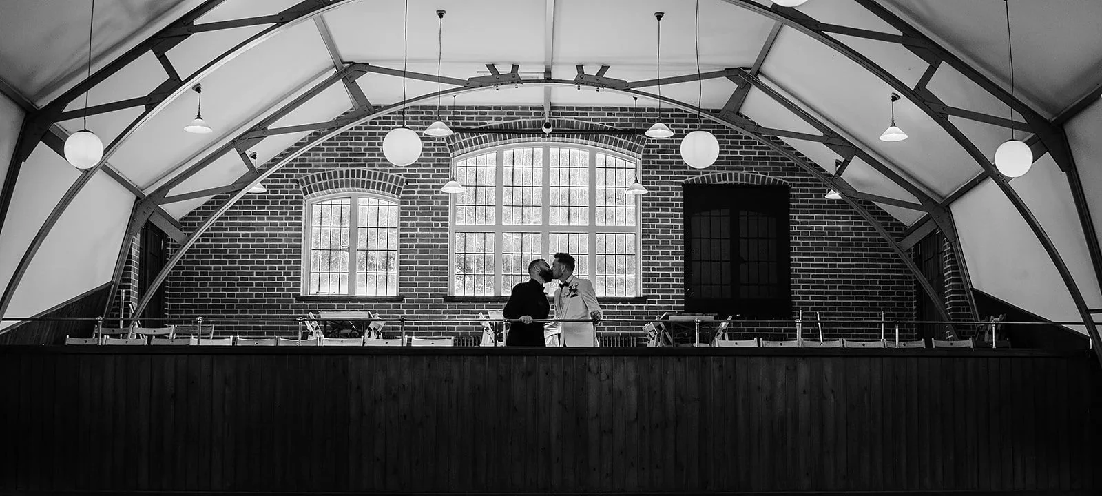 Wedding couple posing inside the Workers Institue at the black country museum