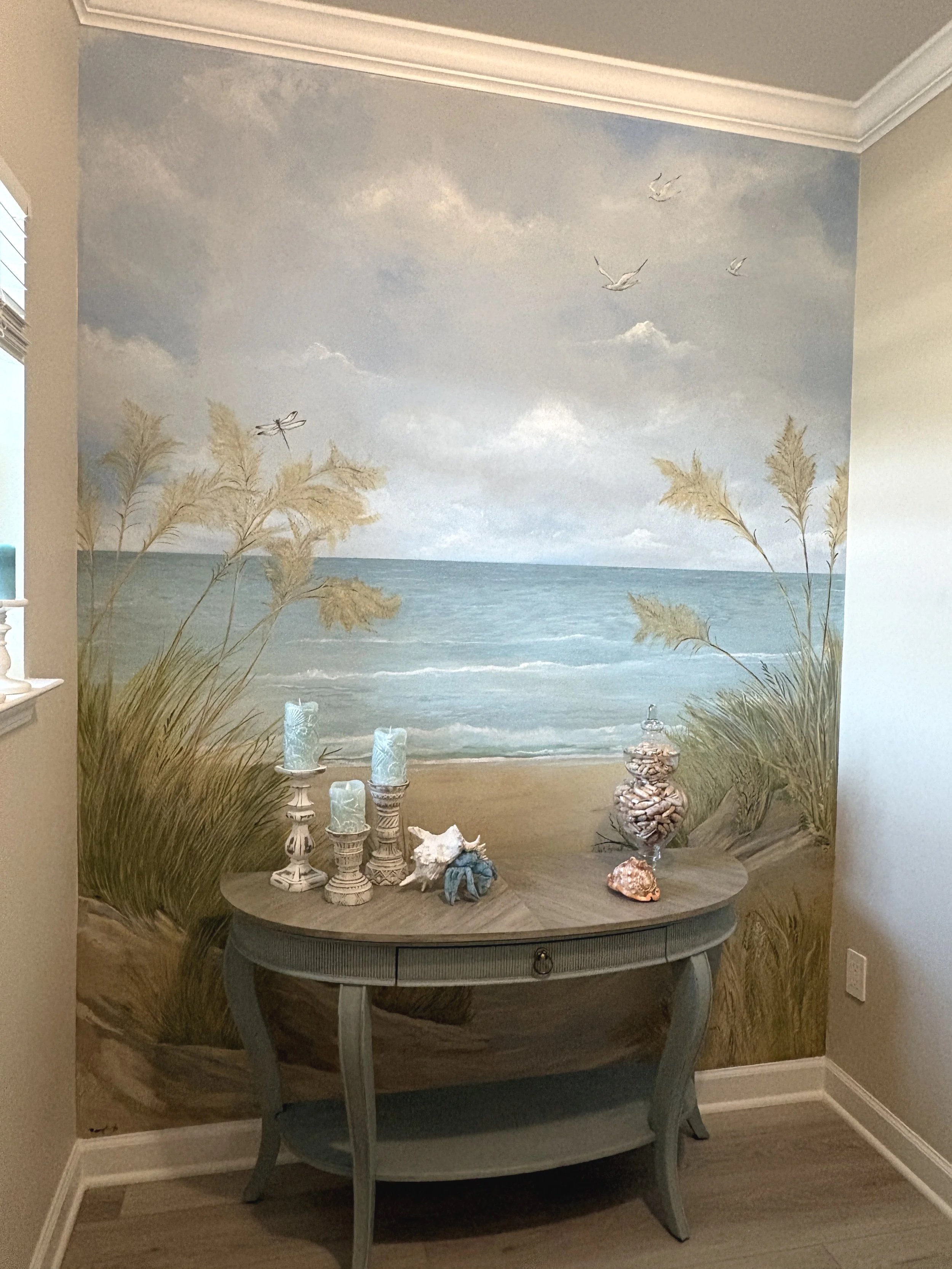 Entryway beach mural with hand painted table.
What a way to greet your guests when they come in...!