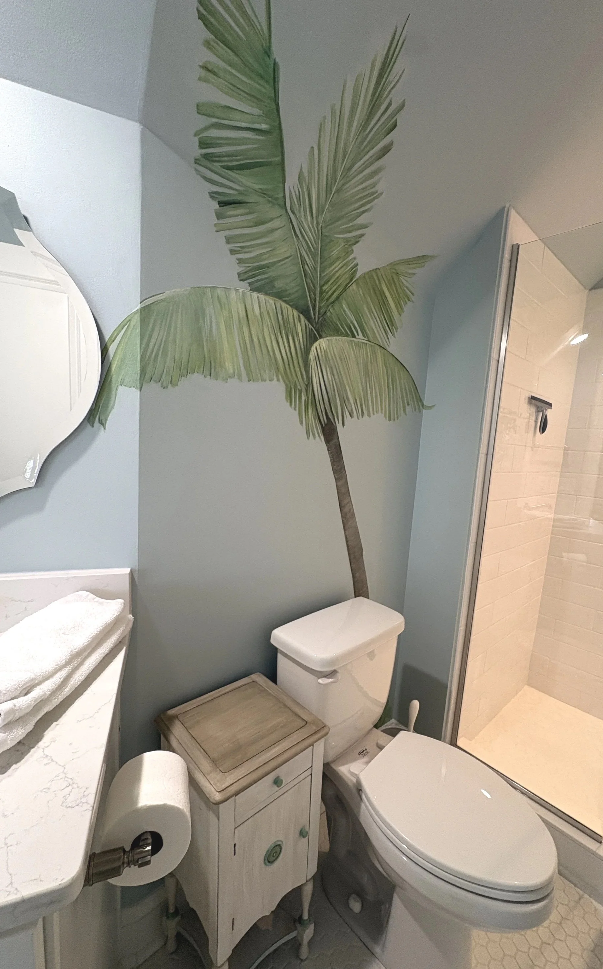 Bring the tropic feel into your home with a life size palm tree mural!
