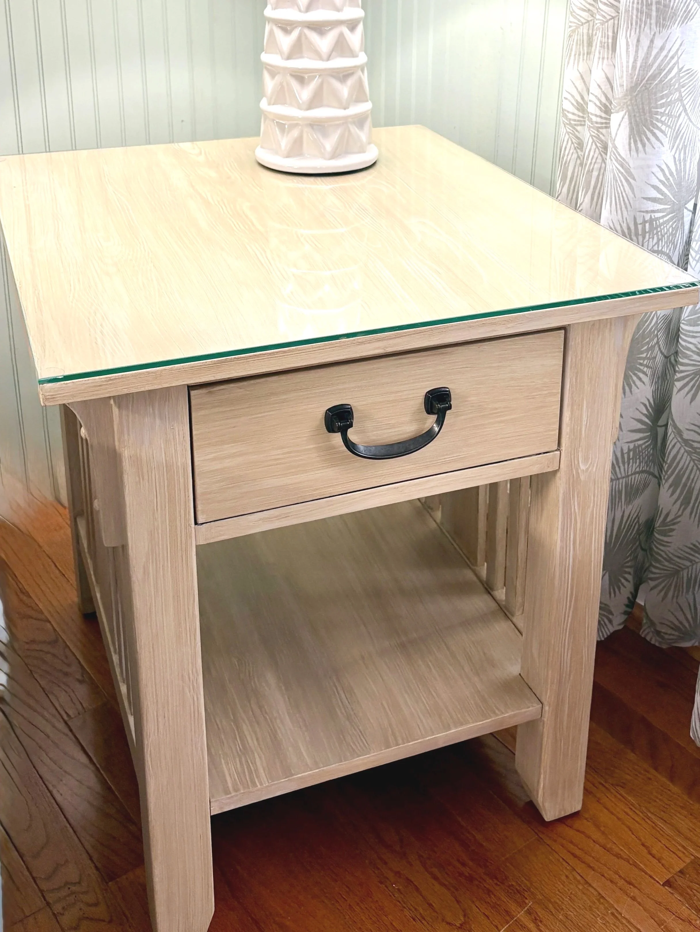 Originally a dark wood piece, the faux grain effect gives a more coastal feel to room while keeping the arts & crafts style.