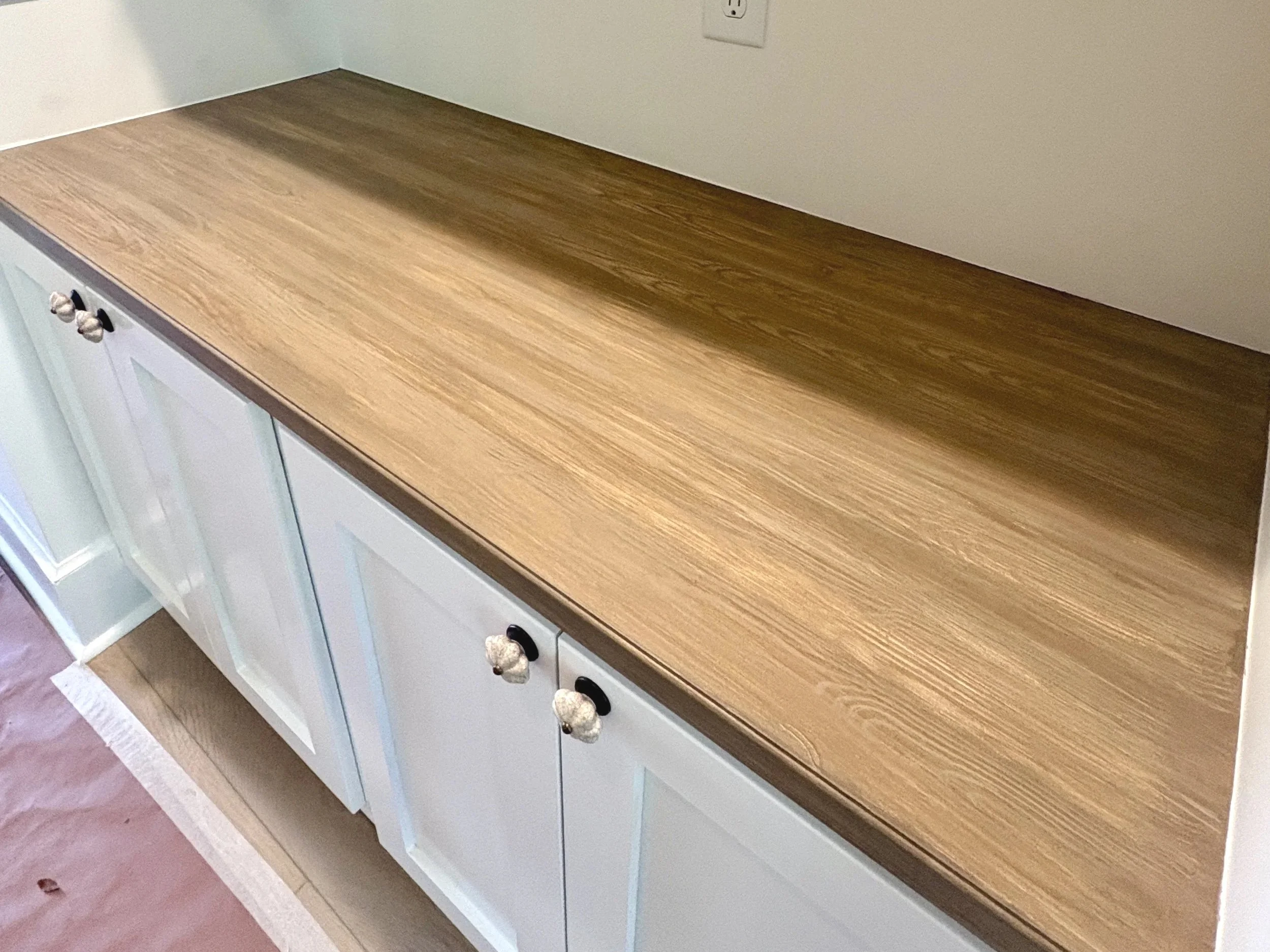Sometimes it's in the details! Just by faux graining the top of this cabinet, it changed the whole look!