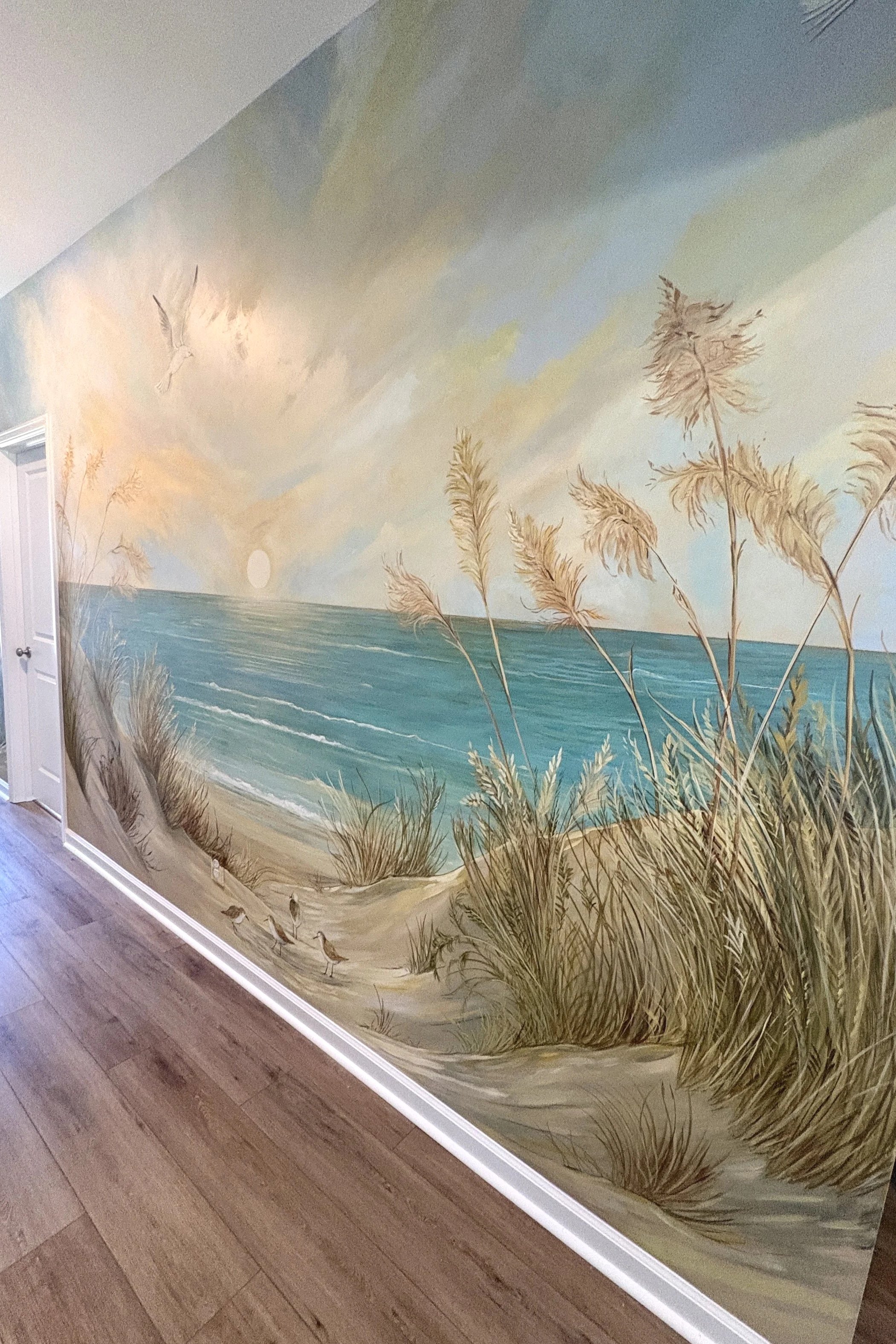 Beautify your entranceway with a custom painted mural! The possibilities are endless.