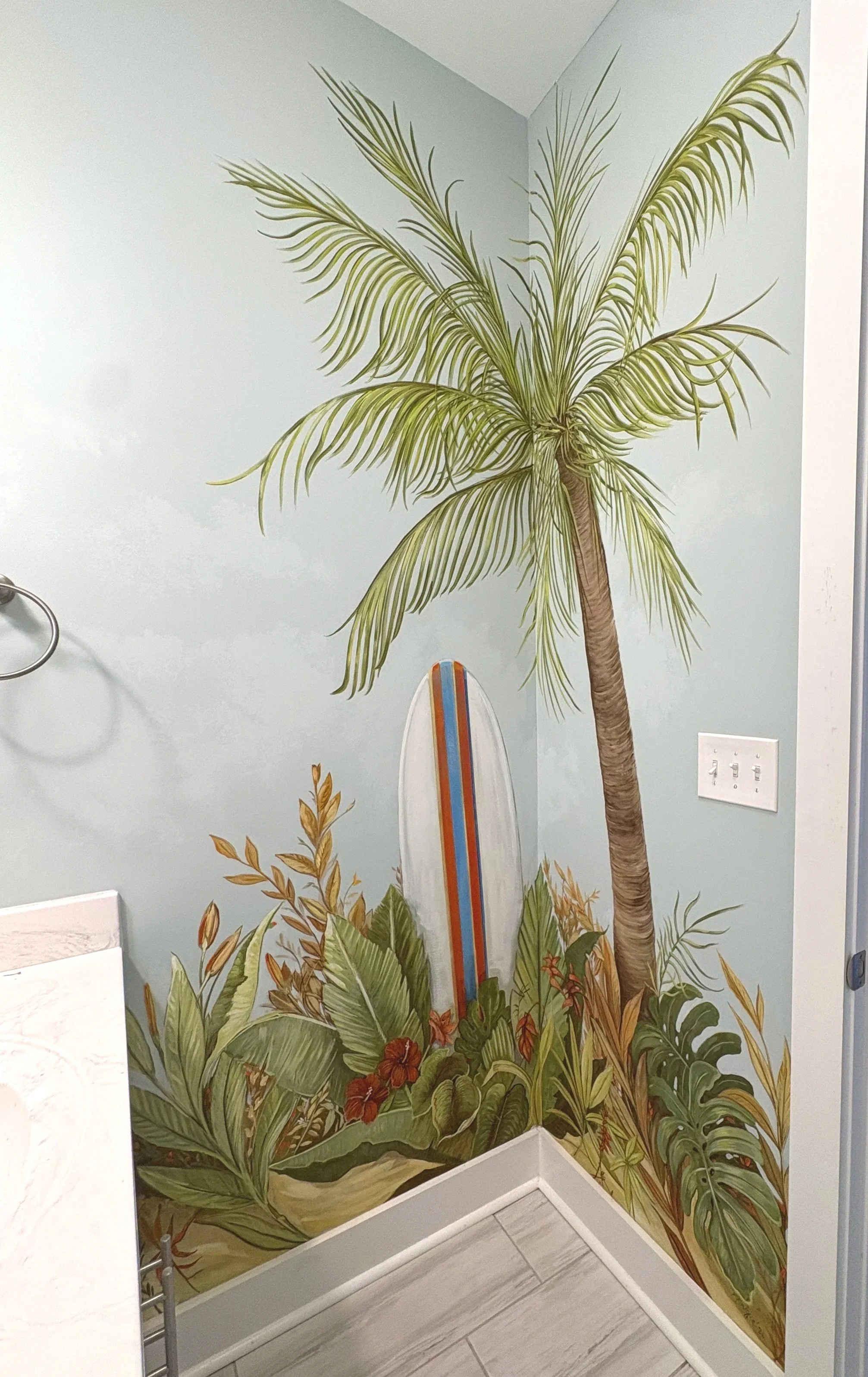 Fun tropical mural replete with surf board, palm tree & colorful tropical flowers!