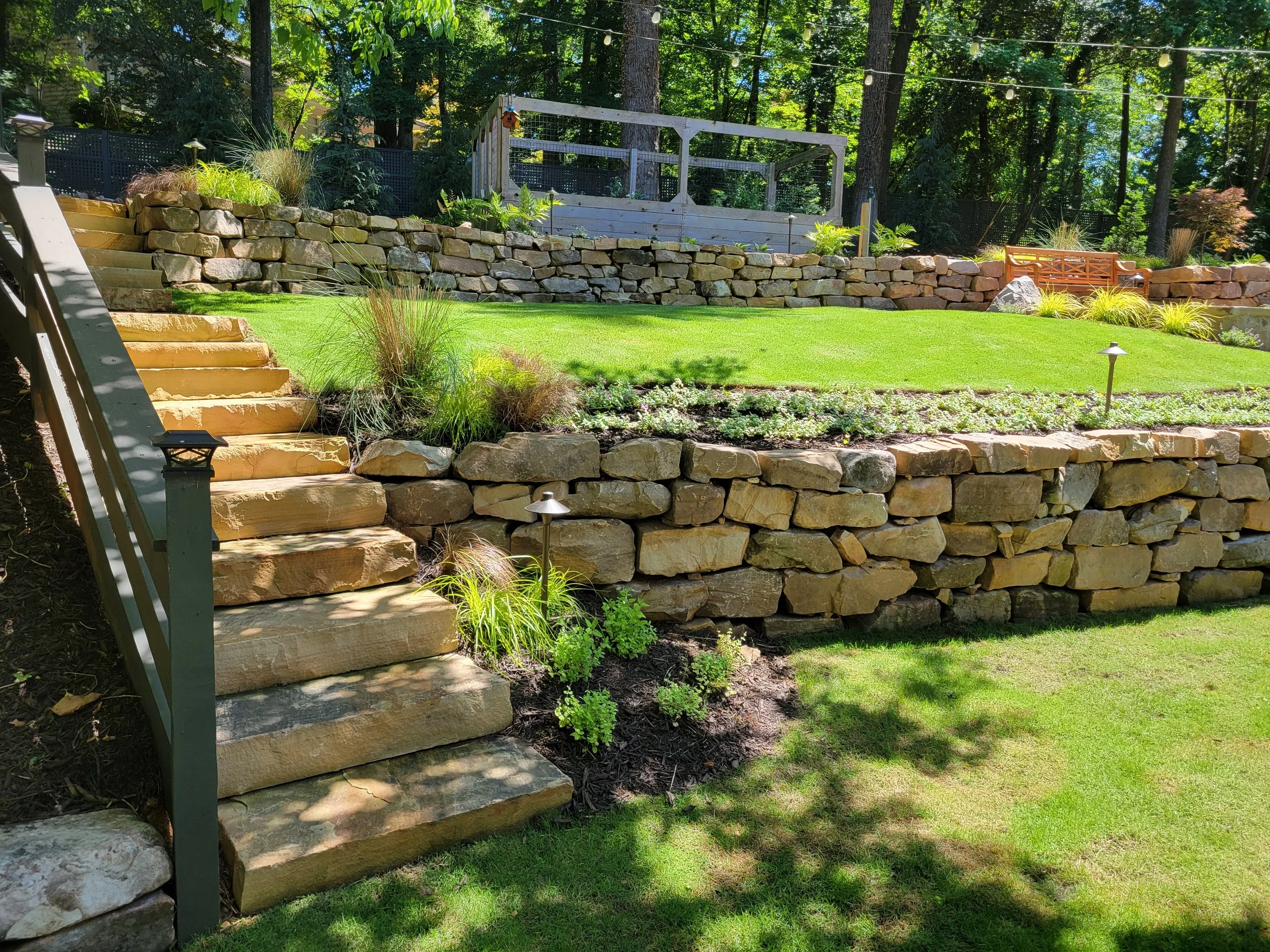Stone Retaining Wall and Stone Steps with Terraced Landscaping