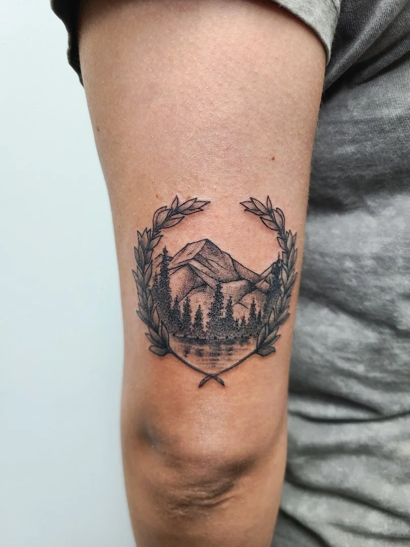 Landscape and Laural Wreath Tattoo.jpg