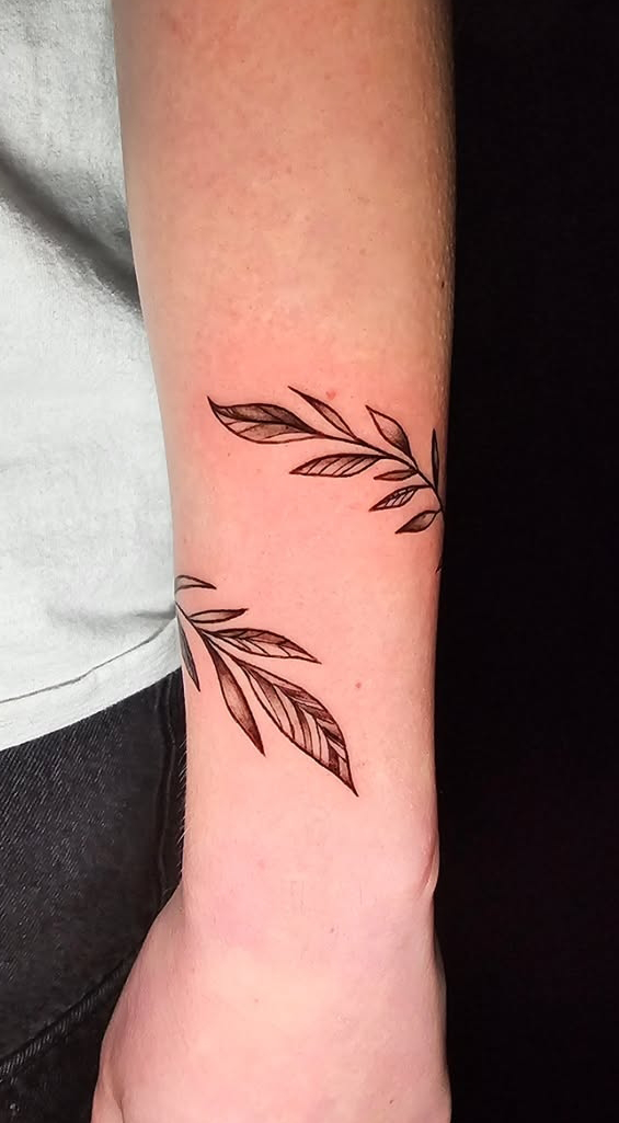 Black and Grey Forearm Tattoo