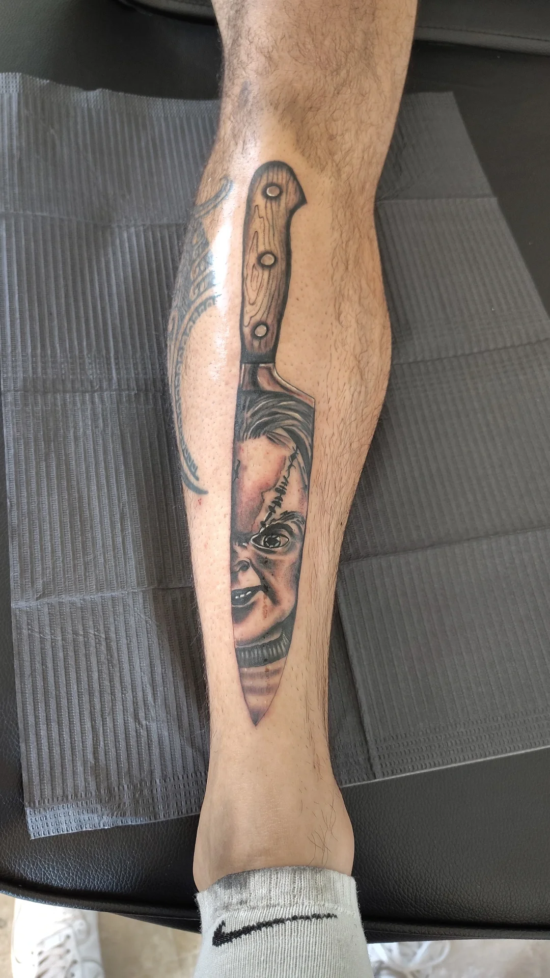 Chucky and Knife Tattoo.webp