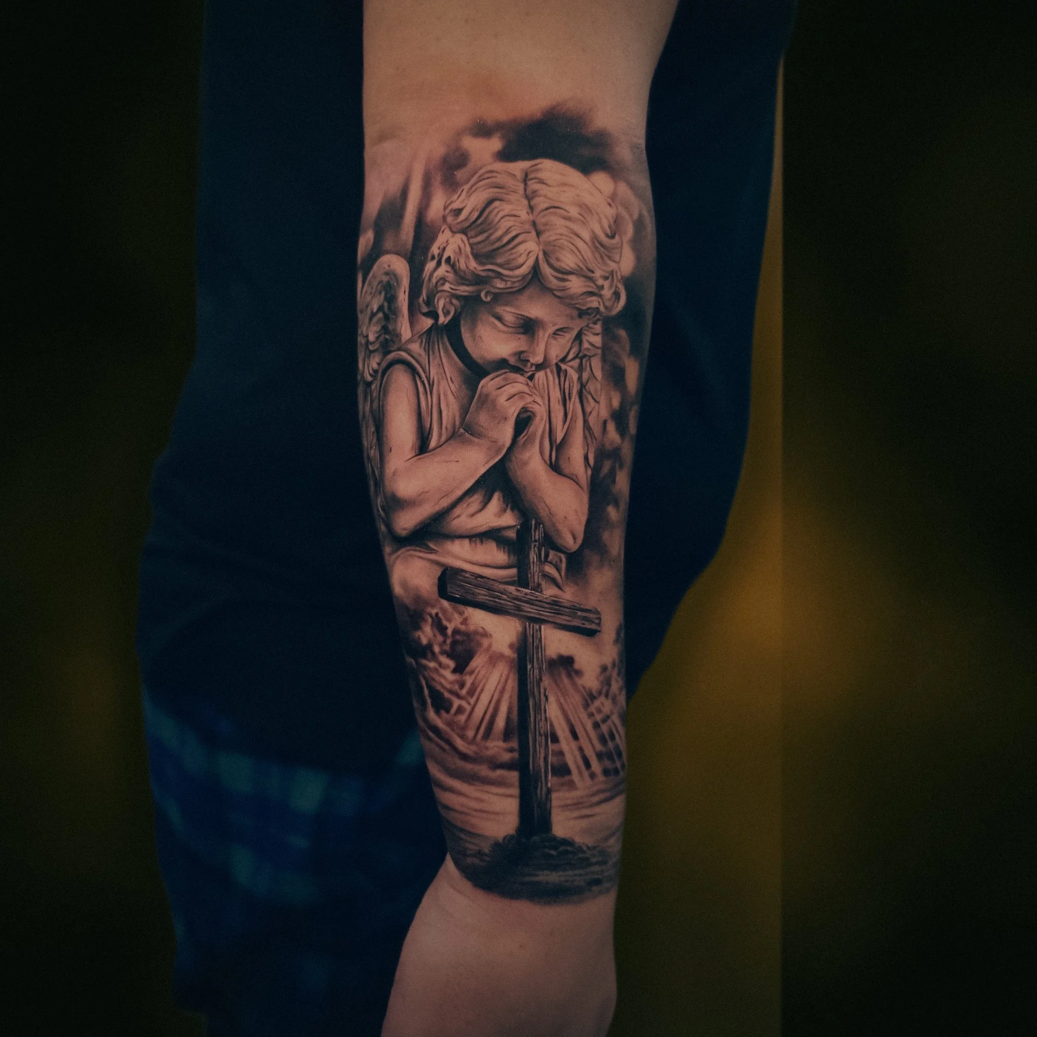 Black and Grey Realism Angel and Cross Tattoo.JPG