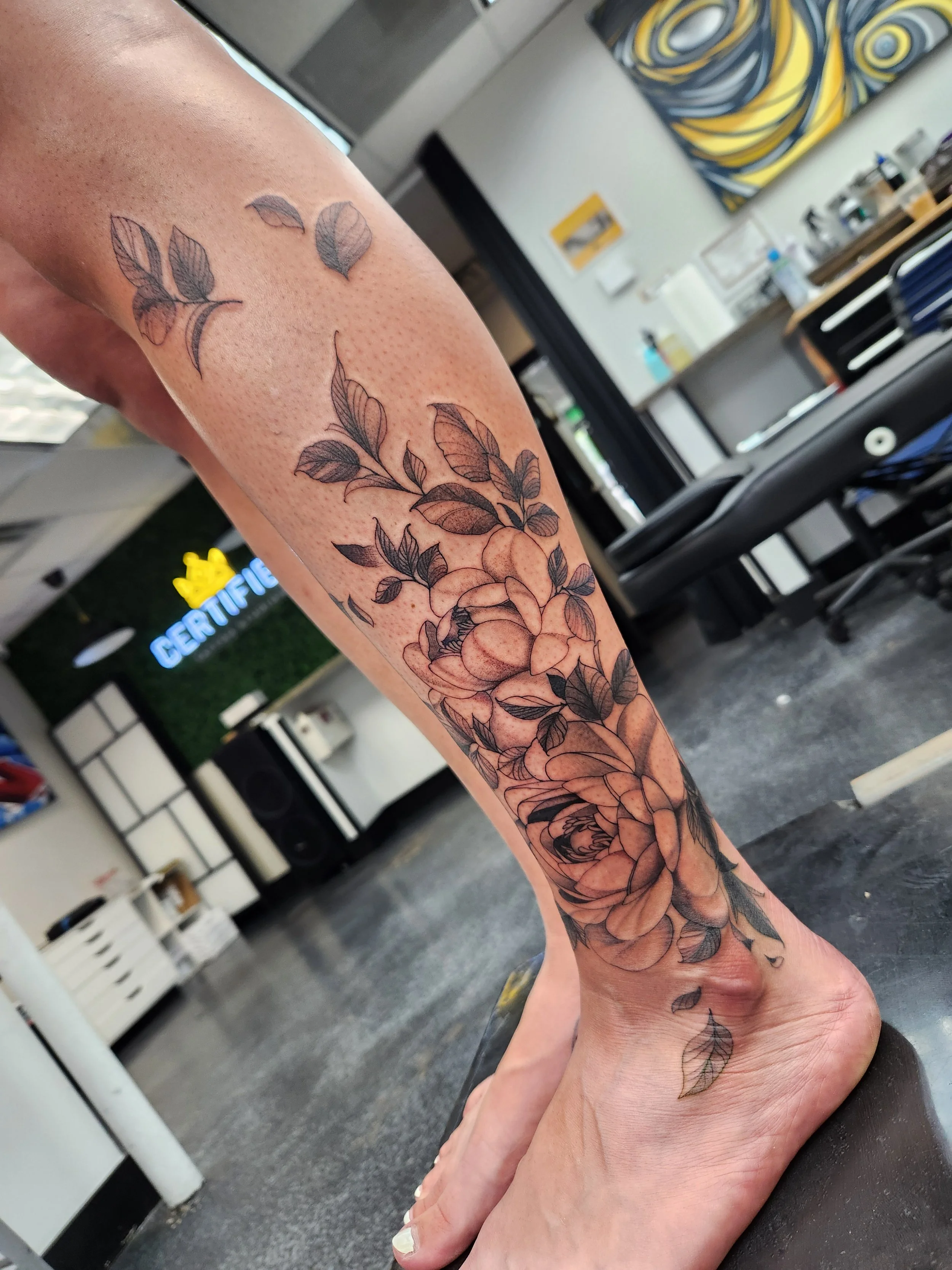 Black and Grey Floral Tattoo on Leg