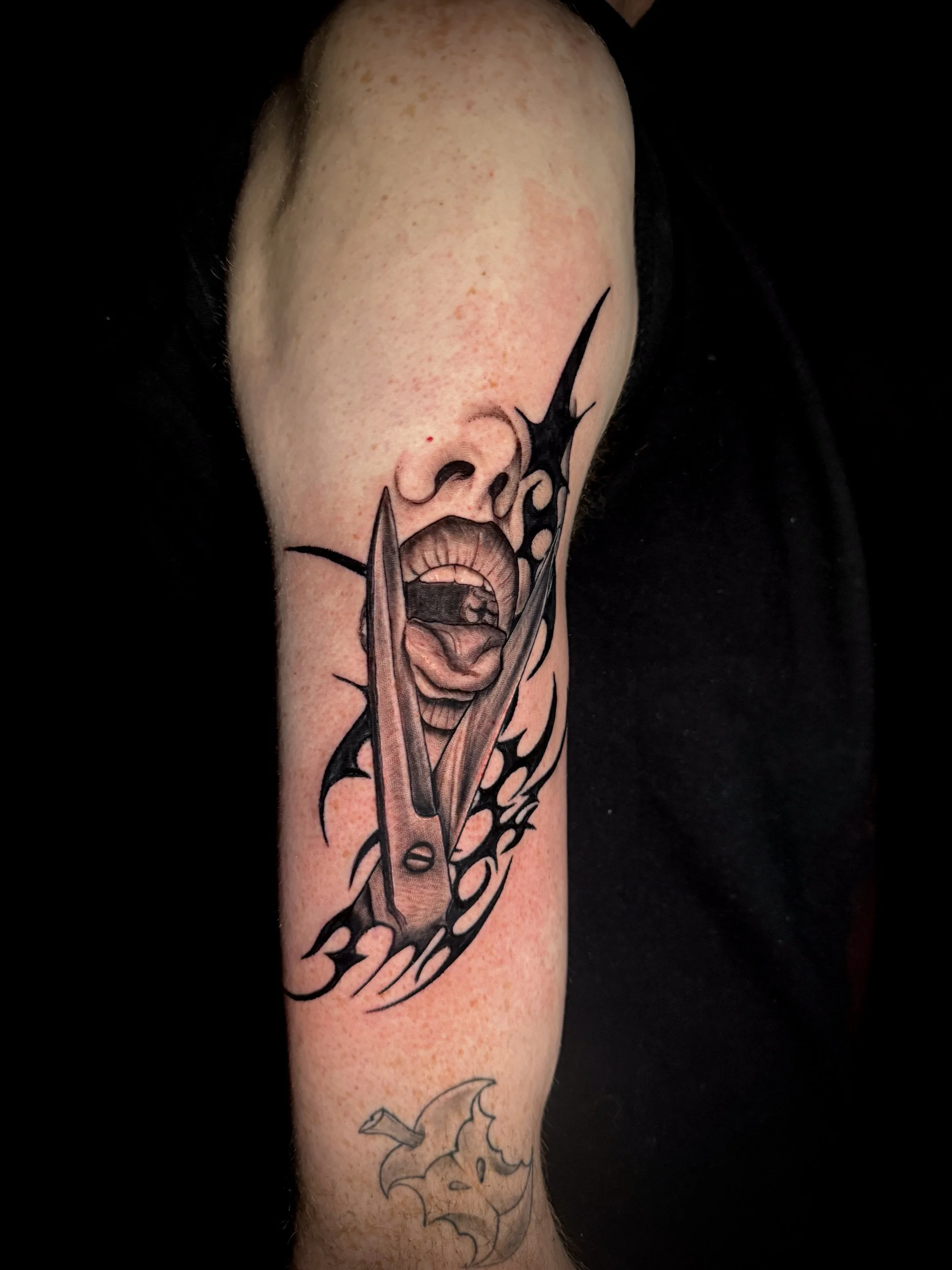 Black and Grey Realism Tattoo.jpeg