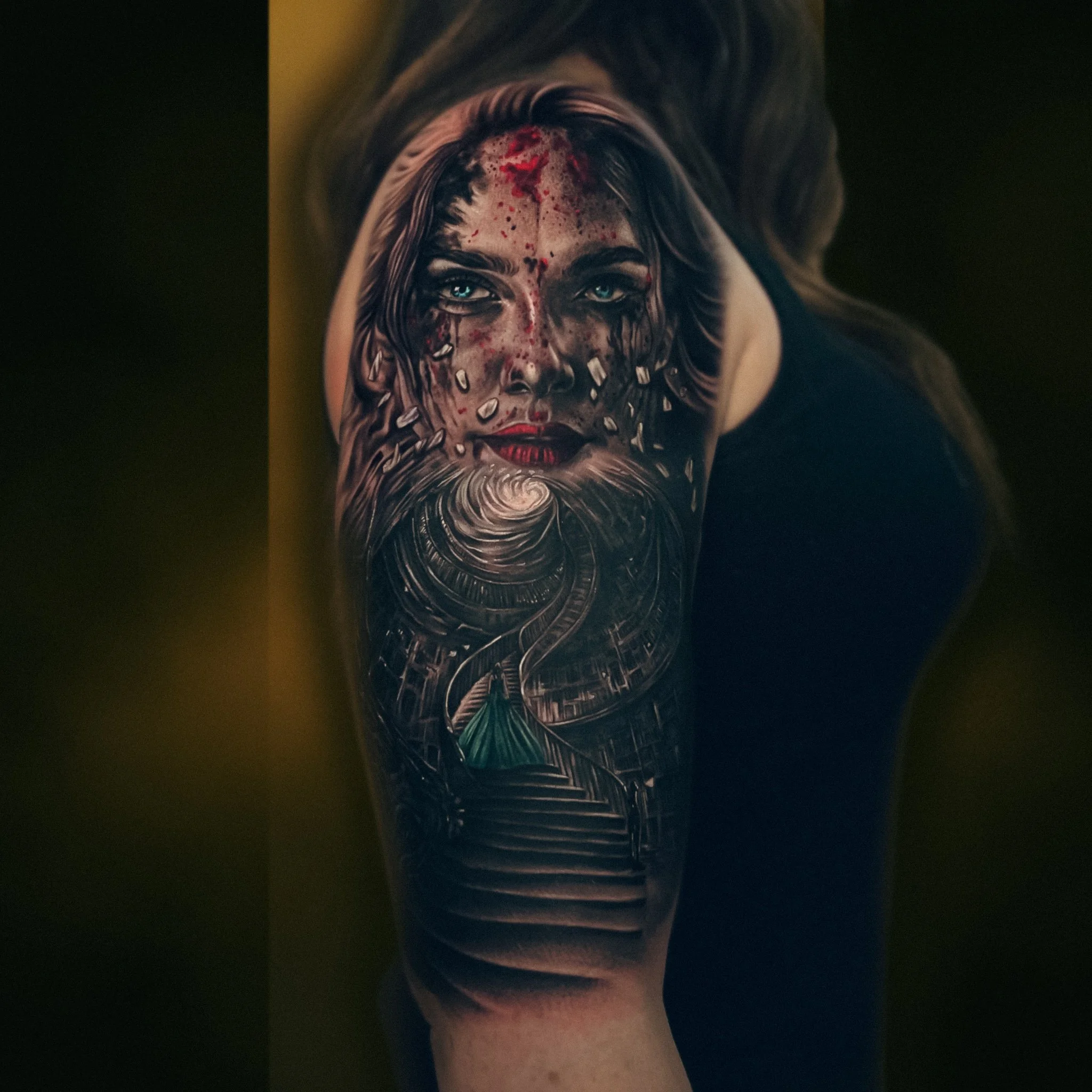 Black and Grey Realism Woman with Abstract Staircase Tattoo.JPG