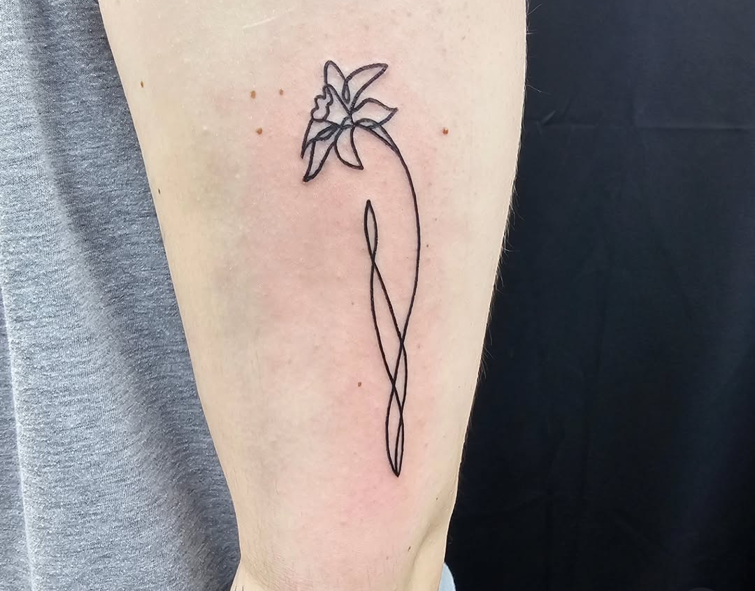 Fine Line Flower Tattoo on Arm 