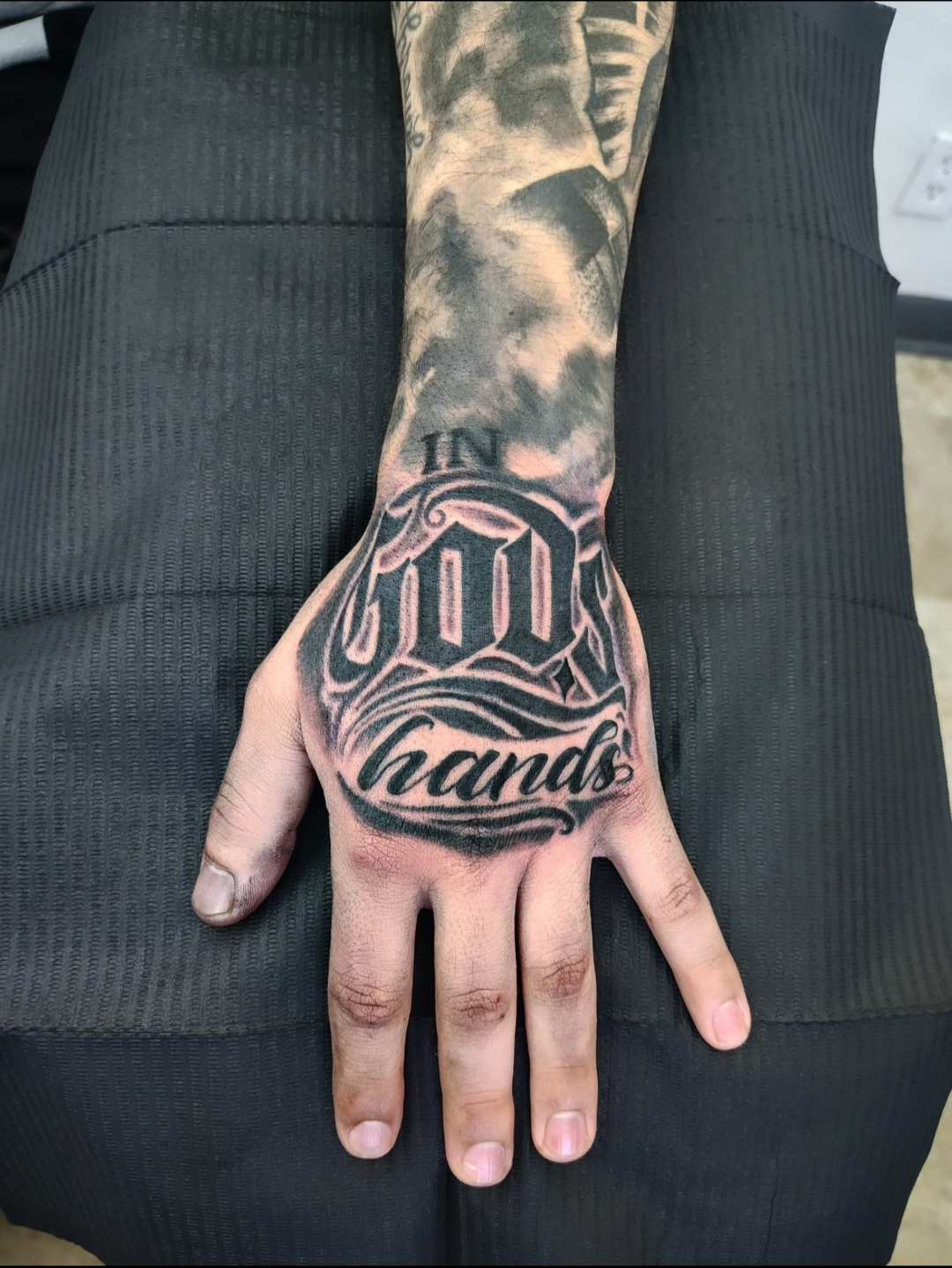 Script on Palm Tattoo.png