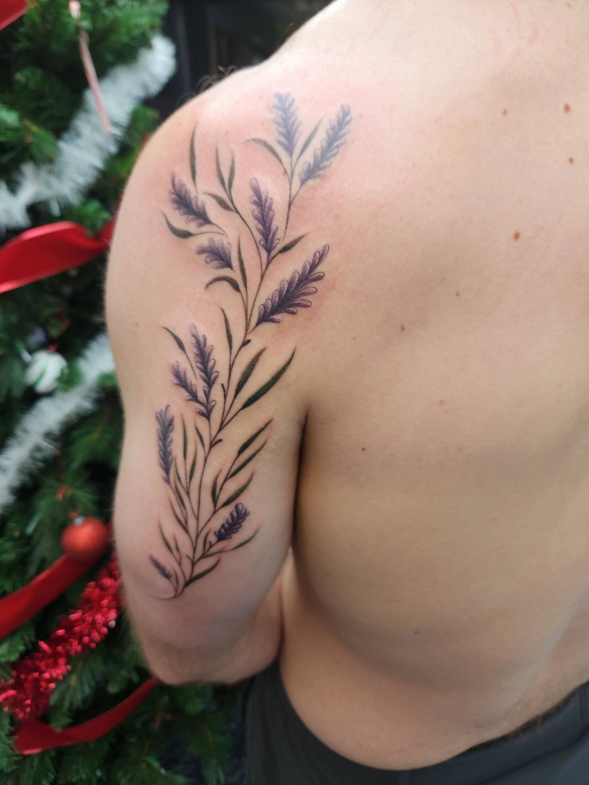 Illustrative Lavender Tattoo on back of Arm 