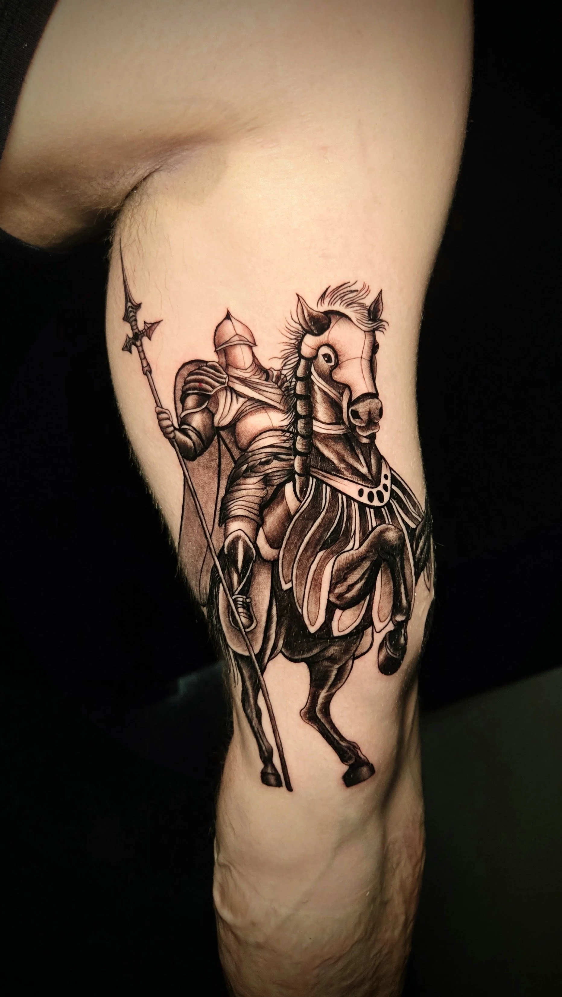 Illustrative Black and Grey Tattoo