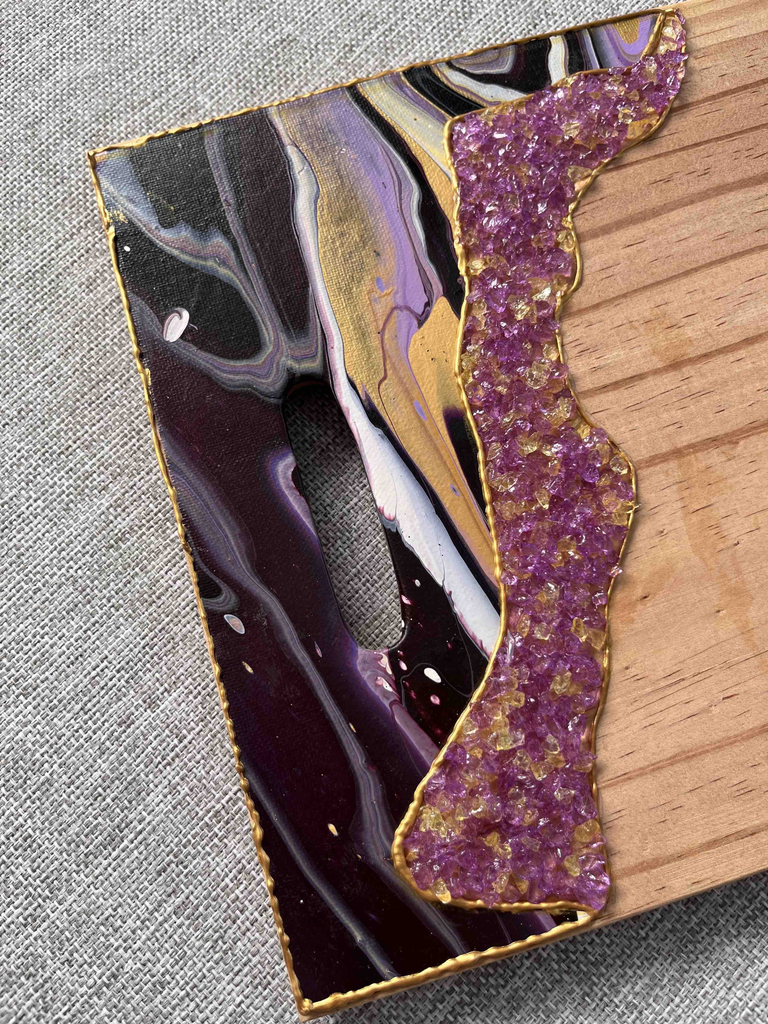 You Cheddar Believe It fluid art charcuterie board with yellow, orange, and white swirls in a cheese-inspired design