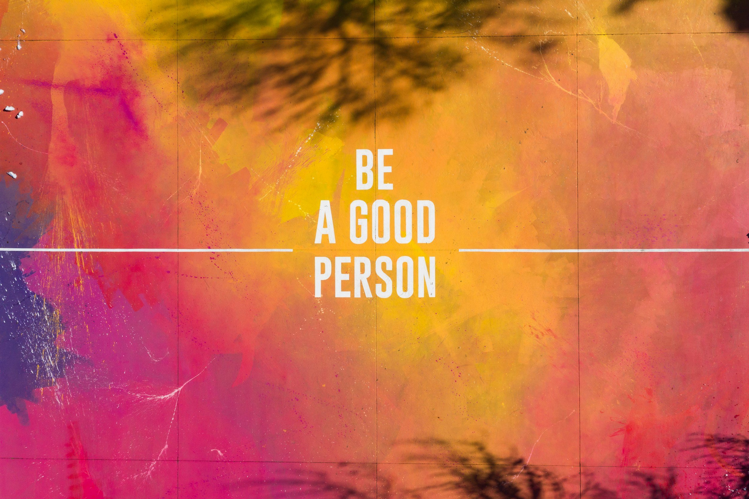 orange sign with white text: Be a good person