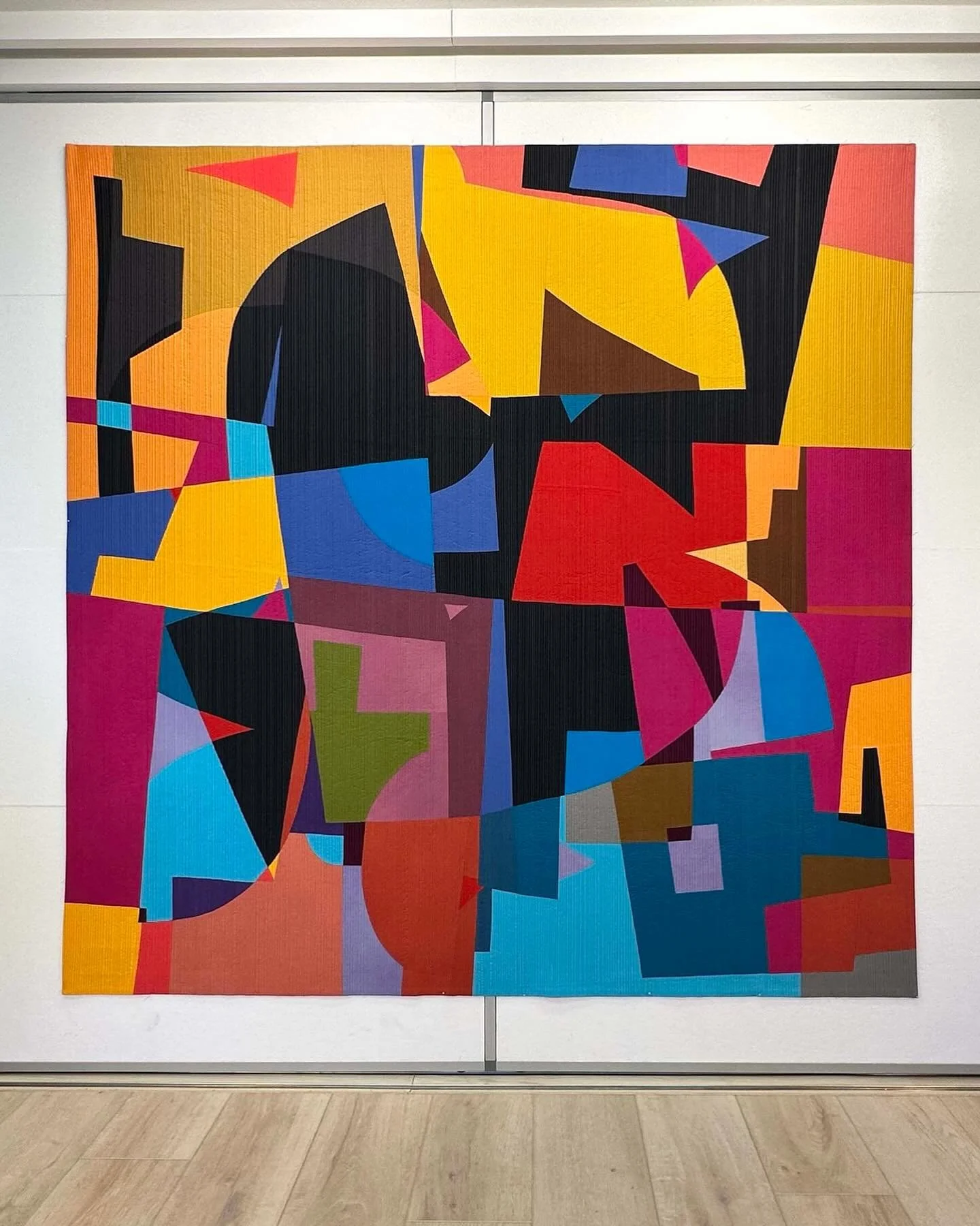 Studio shot-this little lady has been traveling the world as a member of Color Improvisations 3, Curated by Nancy Crow.  80&rdquo; x 80&rdquo;. I was thinking about her today-Epoch #3. This was a pivotal piece in my series. I have made 5 more in this