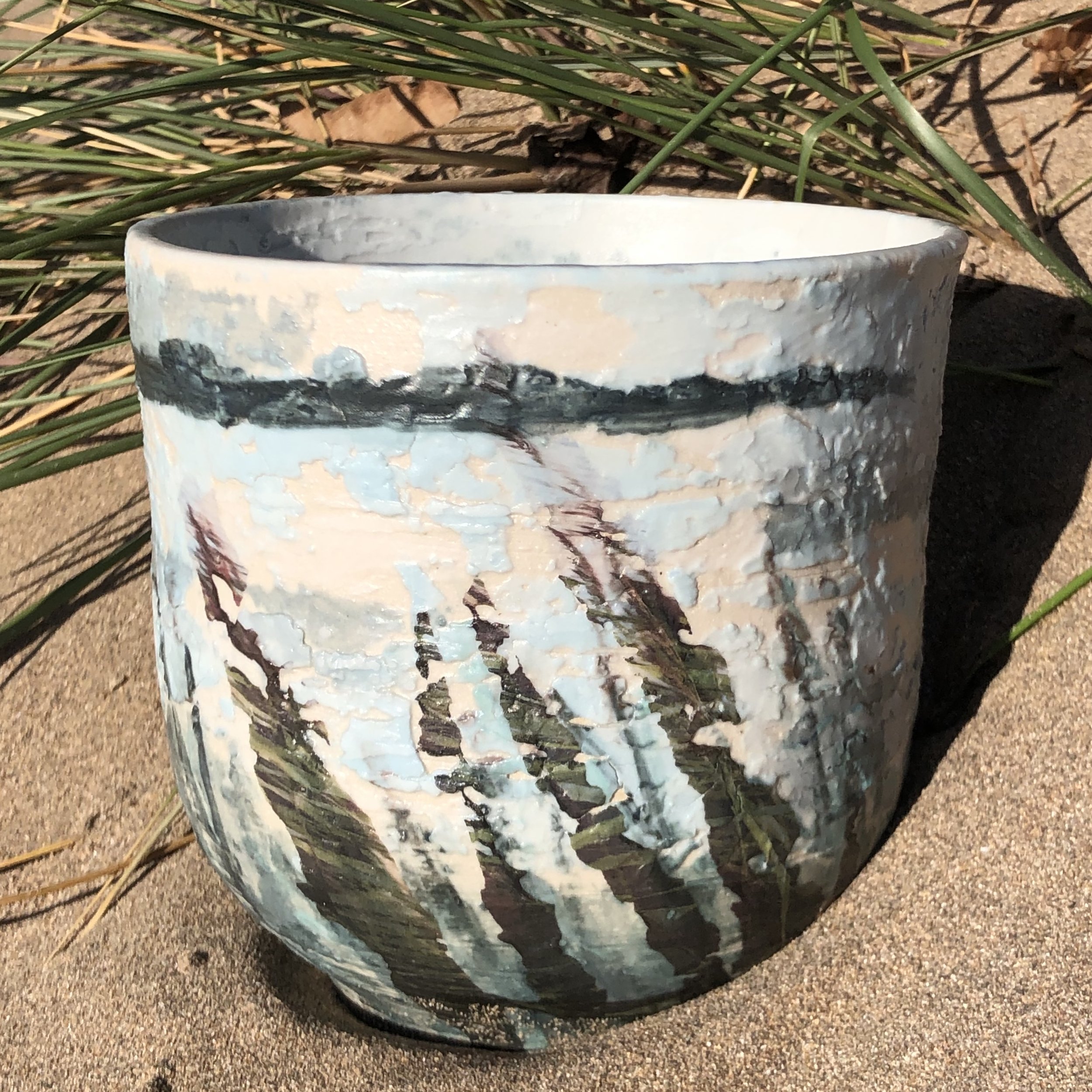 Stoneware thrown pot, hand painted porcelain slips and photographic decals.