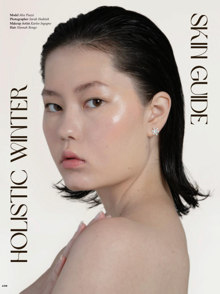 Close-up of a young woman with short dark hair and natural makeup, promoting holistic winter skincare, with the words 'HOLISTIC WINTER SKIN GUIDE' on the image.