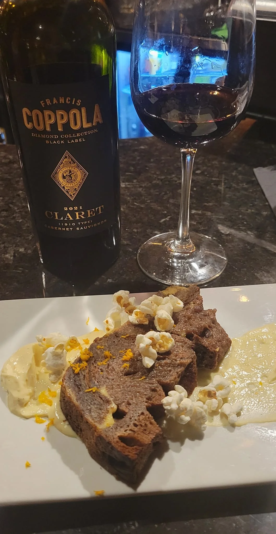 brown sugar chocolate bread pudding, cream cheese, orange, popcorn