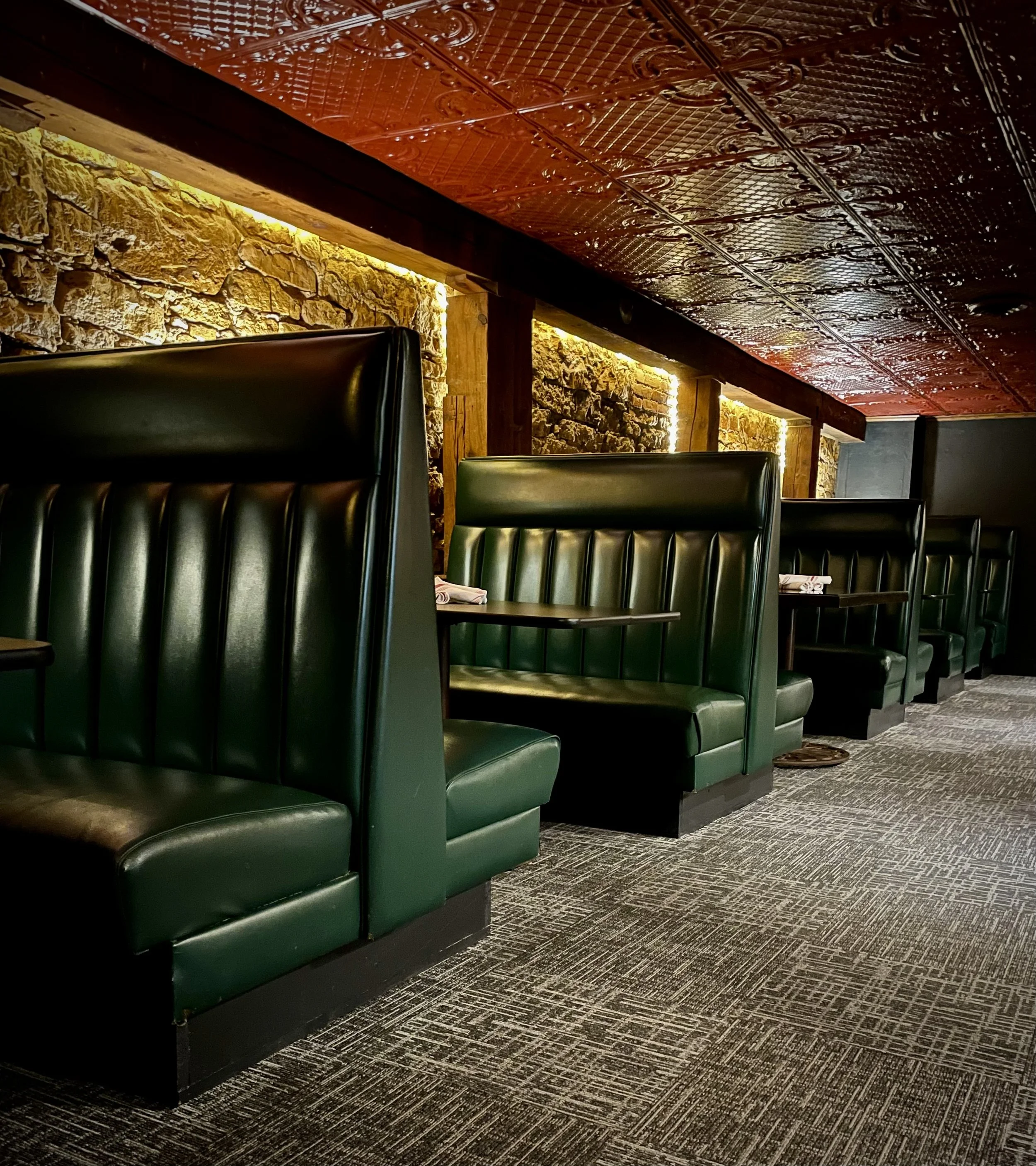 cozy atmosphere booth seating warm speakeasy restaurant dining upscale