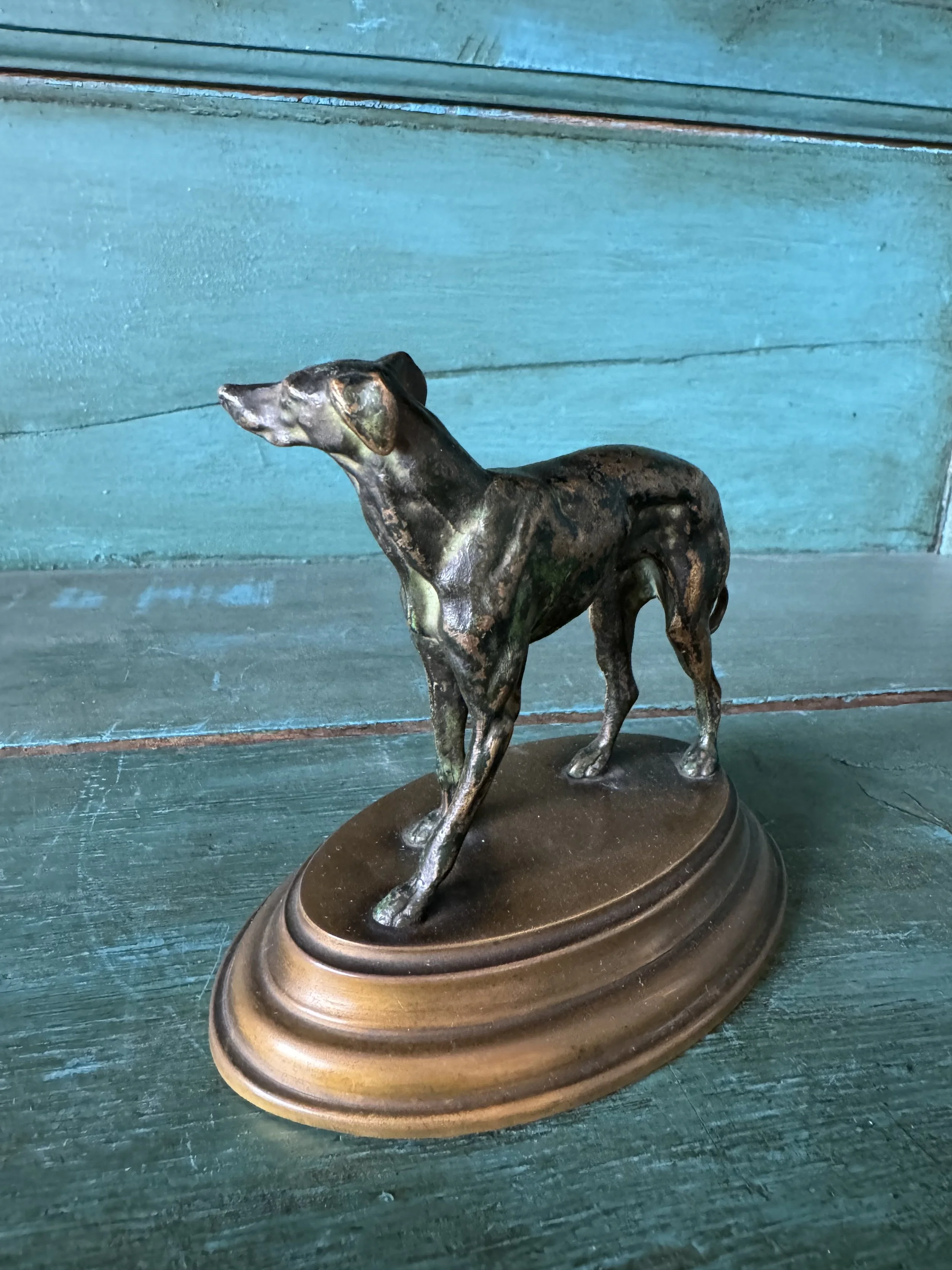 This is a picture of a very lovely antique French bronze animalier figure of a dog c1900.