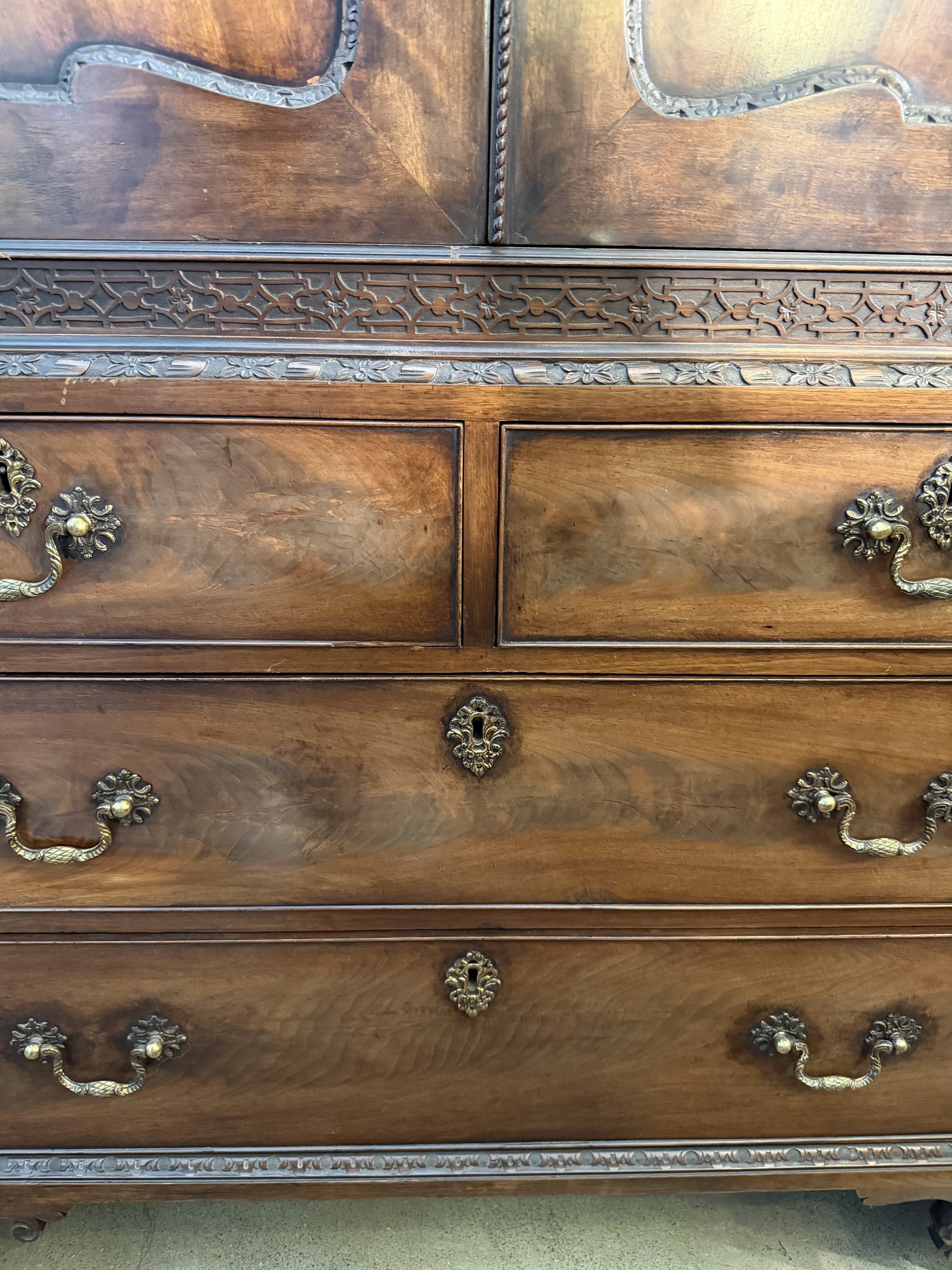 This is a picture of a very handsome George II period Cuban mahogany dwarf wardrobe with its original metalware in the manner of Giles Grendey c1750.