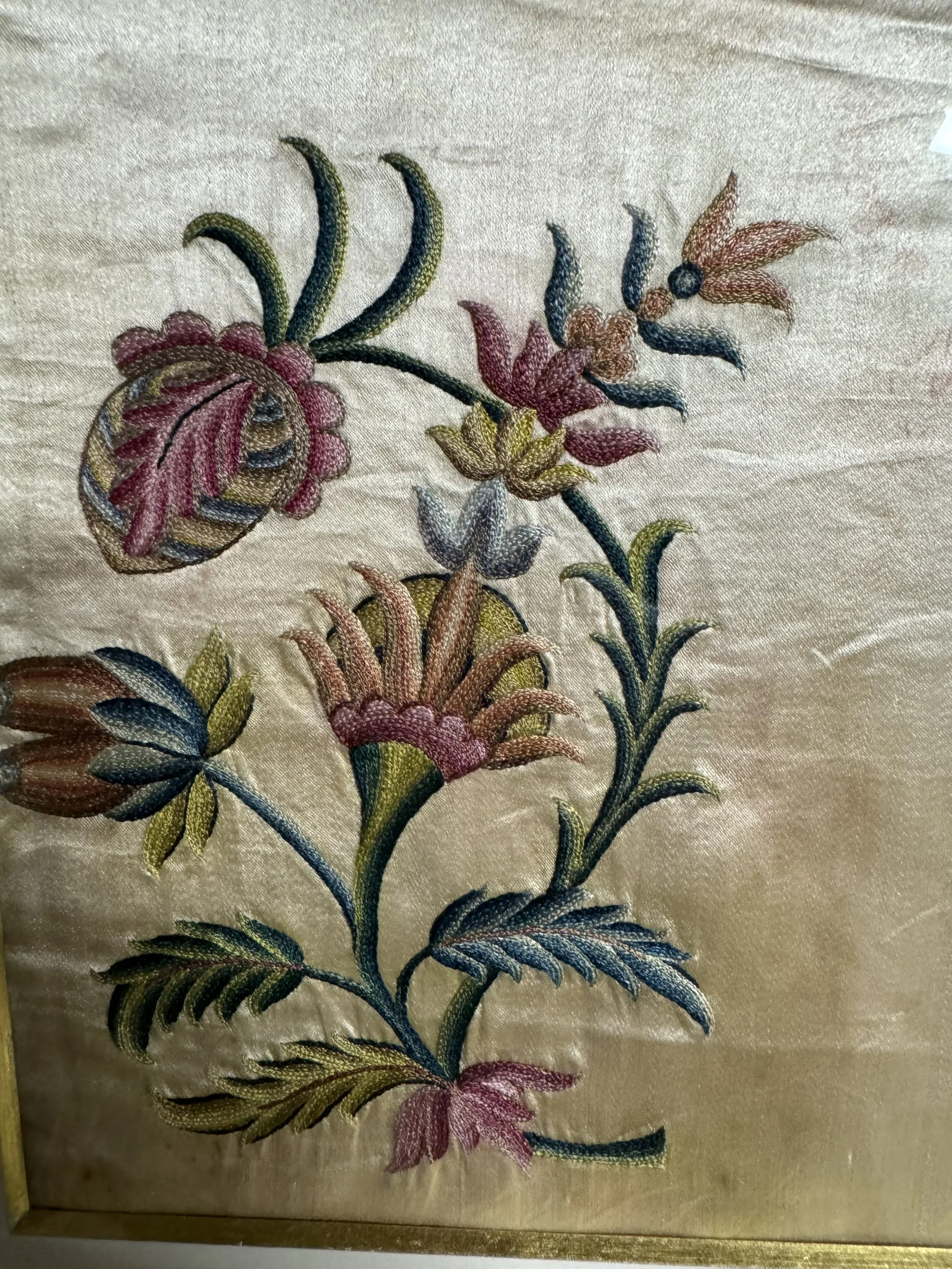 This is a picture of a very finely worked piece of framed late 18th century Chinese silk embroidery.
