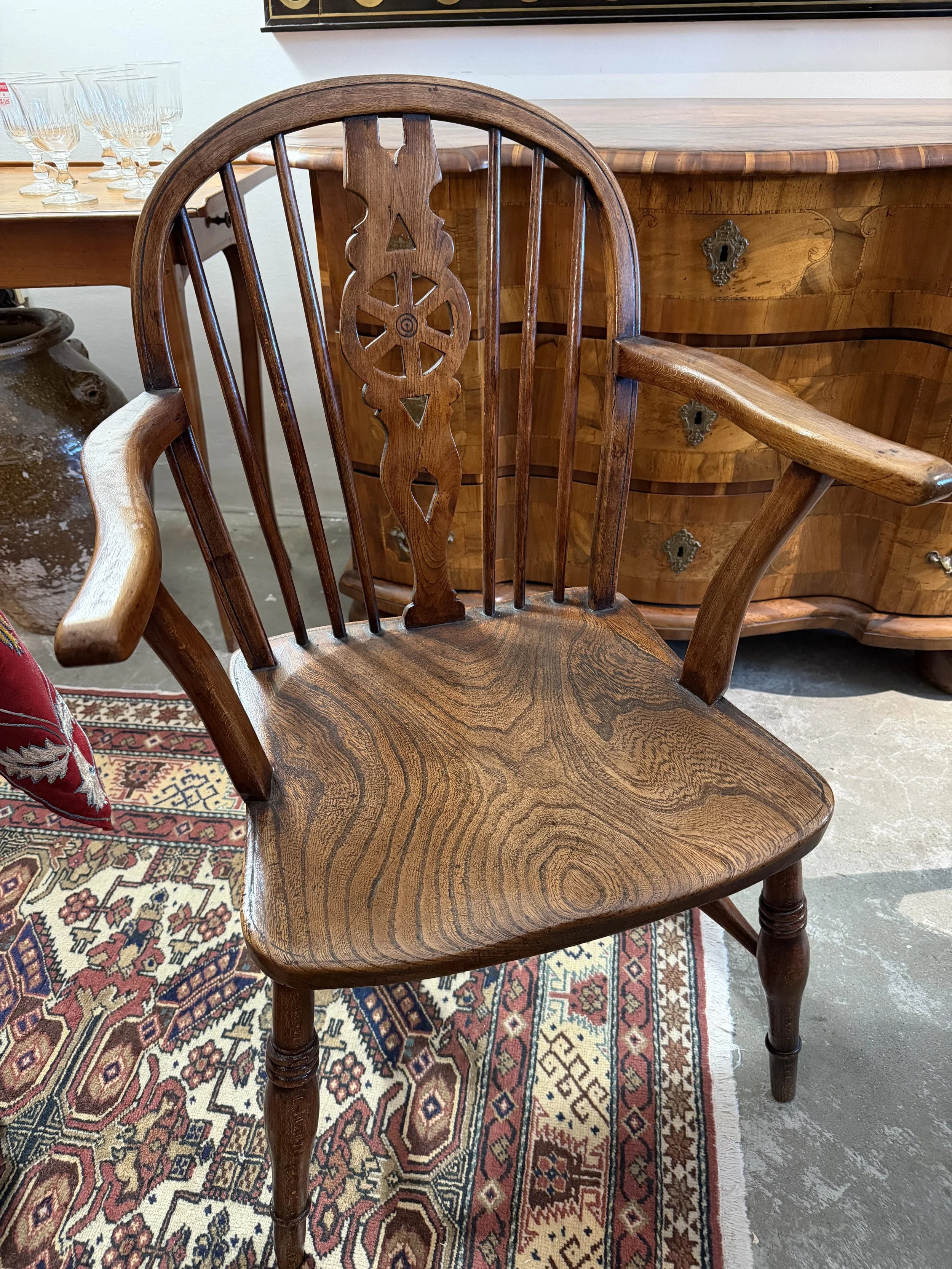 This is a picture of a fabulous mid 19th century ‘Wheelback’ Windsor chair from Buckinghamshire in elm and fruitwood c1850.