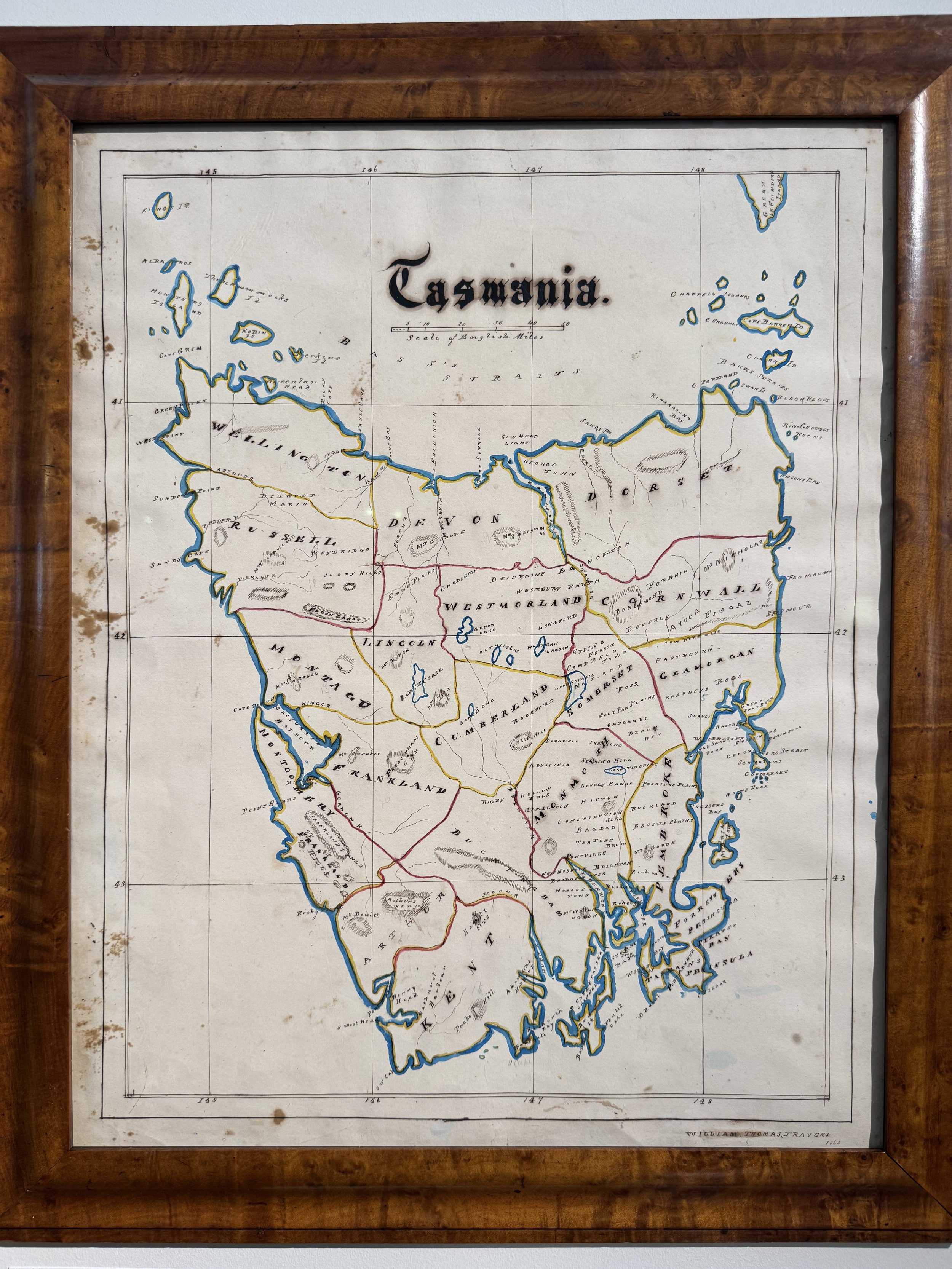 This is a picture of an antique colonial hand drawn and coloured map of Tasmania by William Thomas Travers dated 1862.