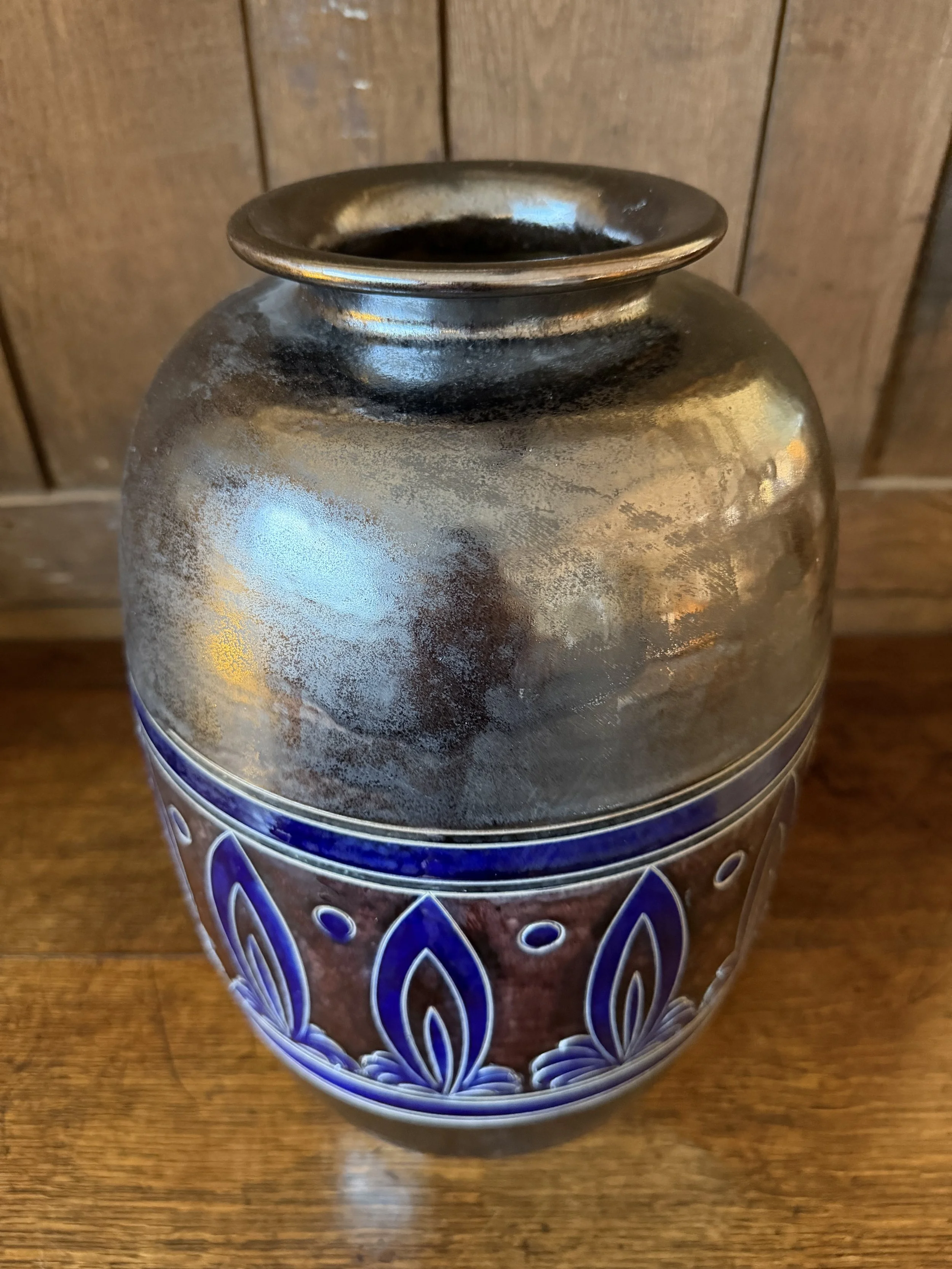 This is a picture of a very decorative early 20th century Secession glazed stoneware vase.