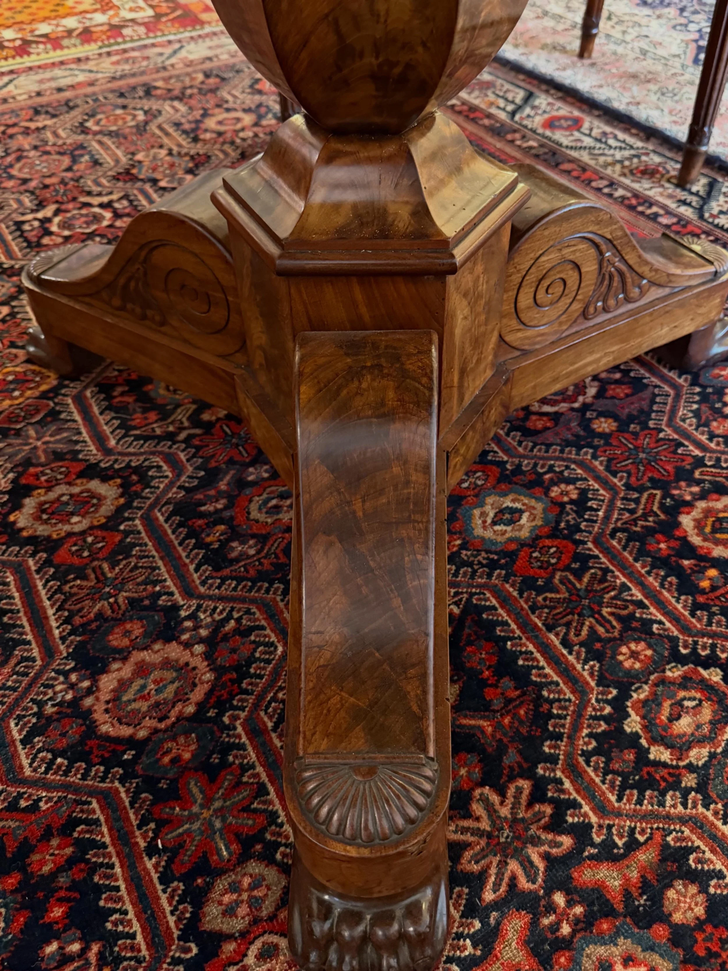This is a picture of a fabulous and finely carved antique Louis Philippe period French mahogany and marbled topped guéridon c1830.