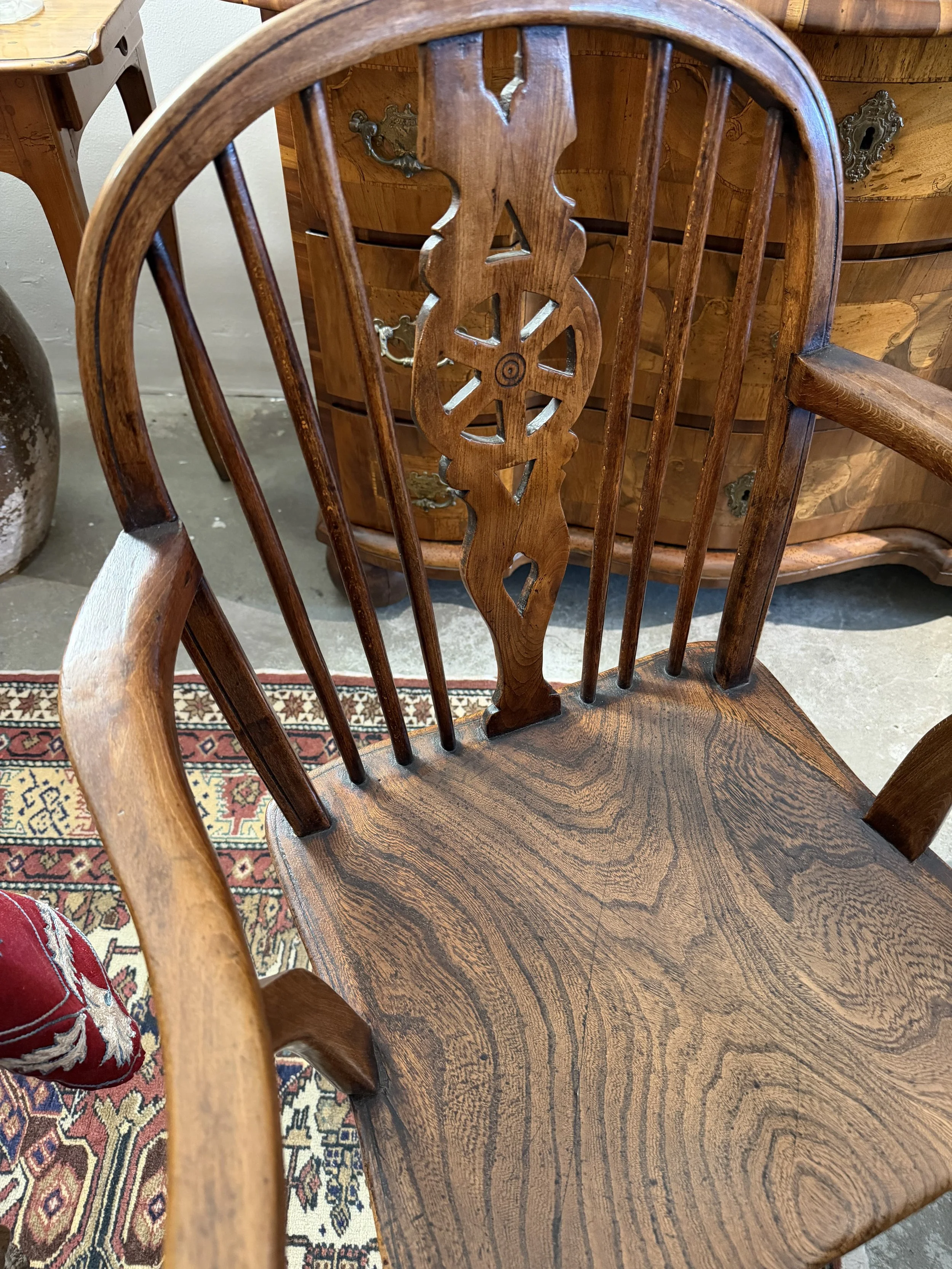 This is a picture of a fabulous mid 19th century ‘Wheelback’ Windsor chair from Buckinghamshire in elm and fruitwood c1850.