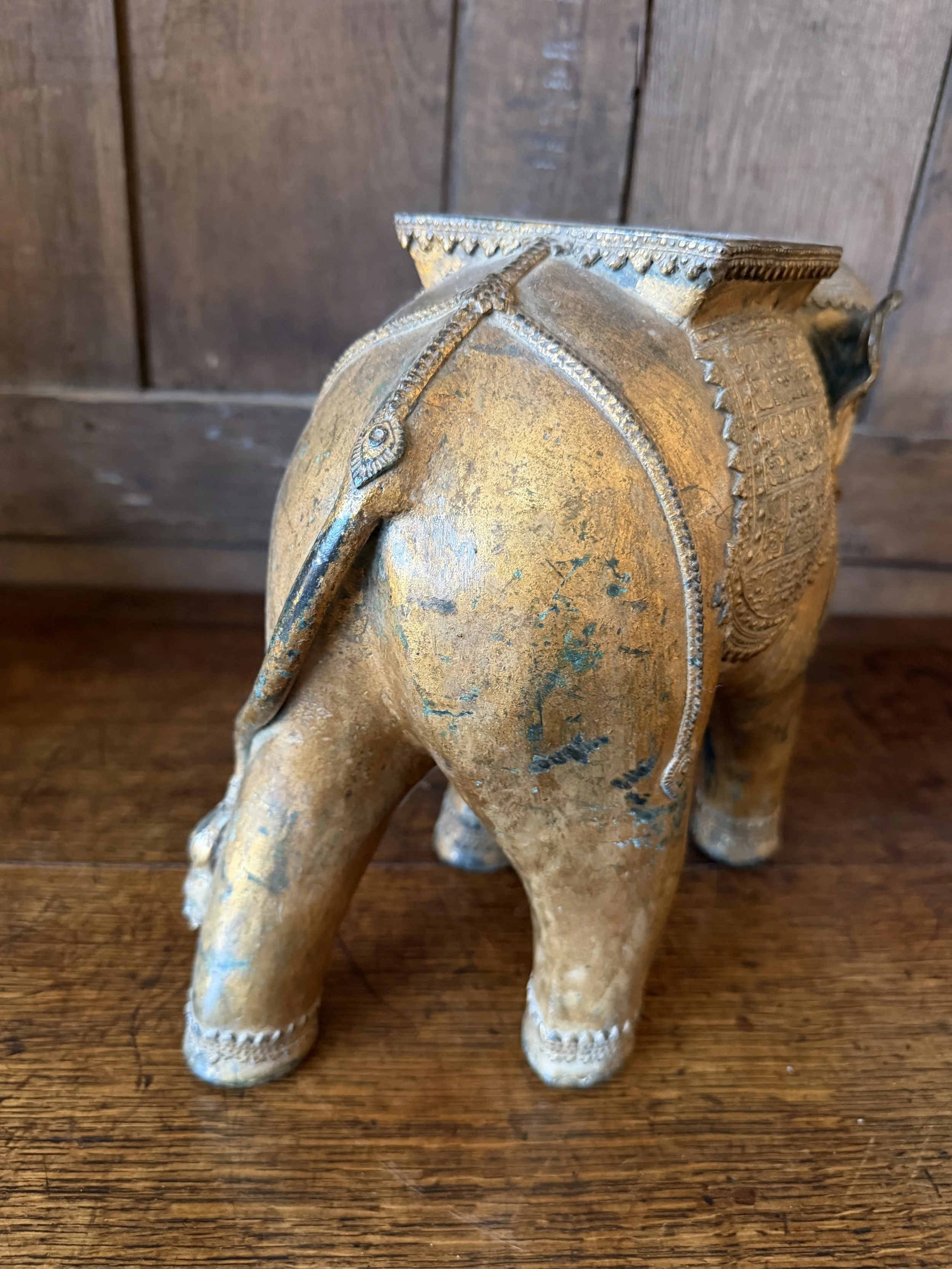 This is a picture of a fabulously decorative late 19th century gilt bronze elephant.