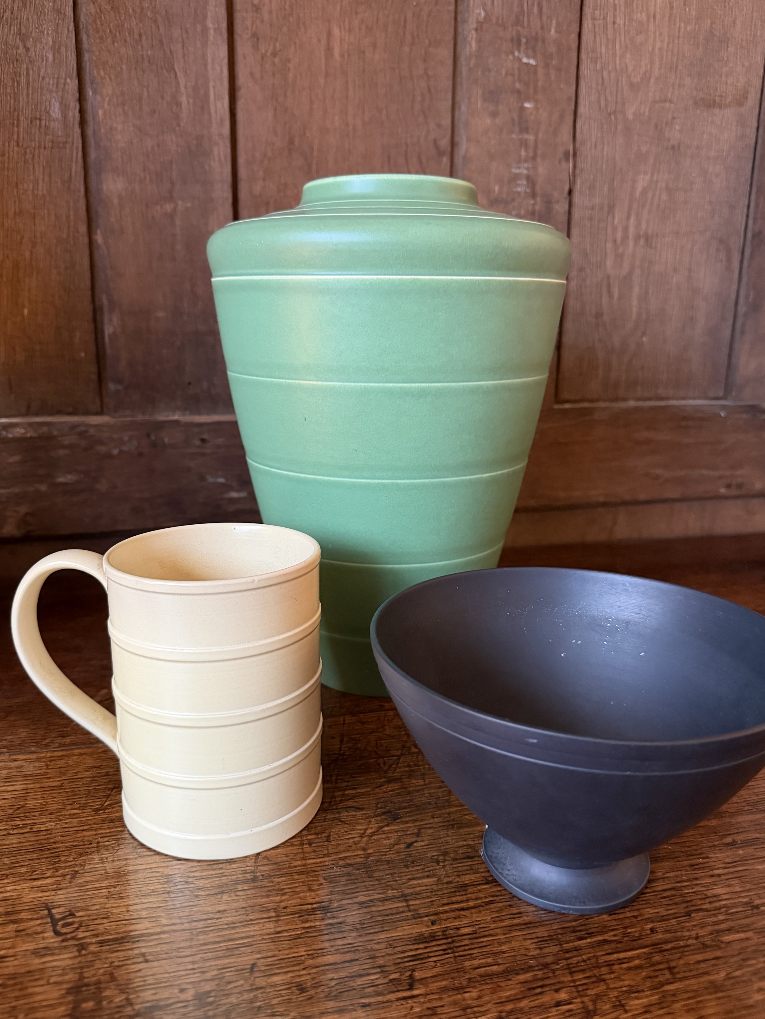 This is a picture of a Keith Murray for Wedgwood Art Deco cream coloured mug c1930.