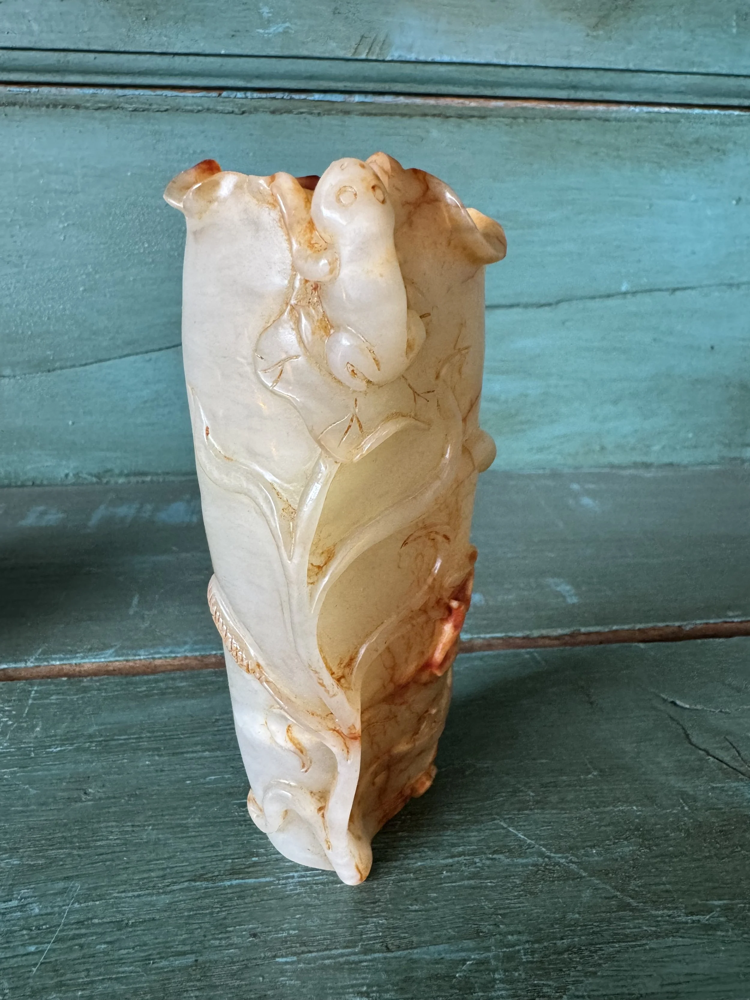 This is a picture of a very beautiful and finely carved antique 19th century Chinese jade brush washer.