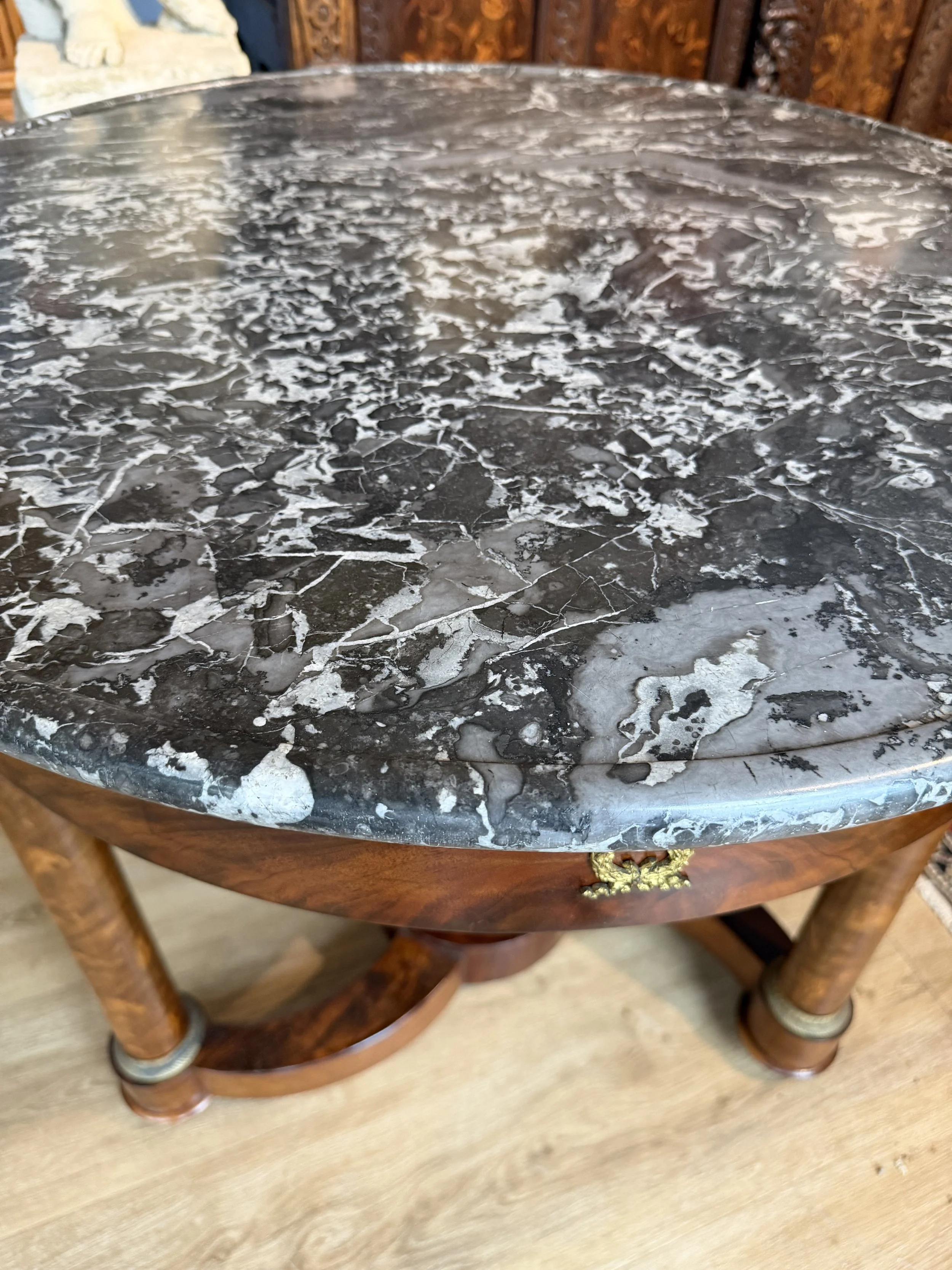 This is a picture of a very elegant French Empire ormolu mounted mahogany marble topped guéridon c1820.