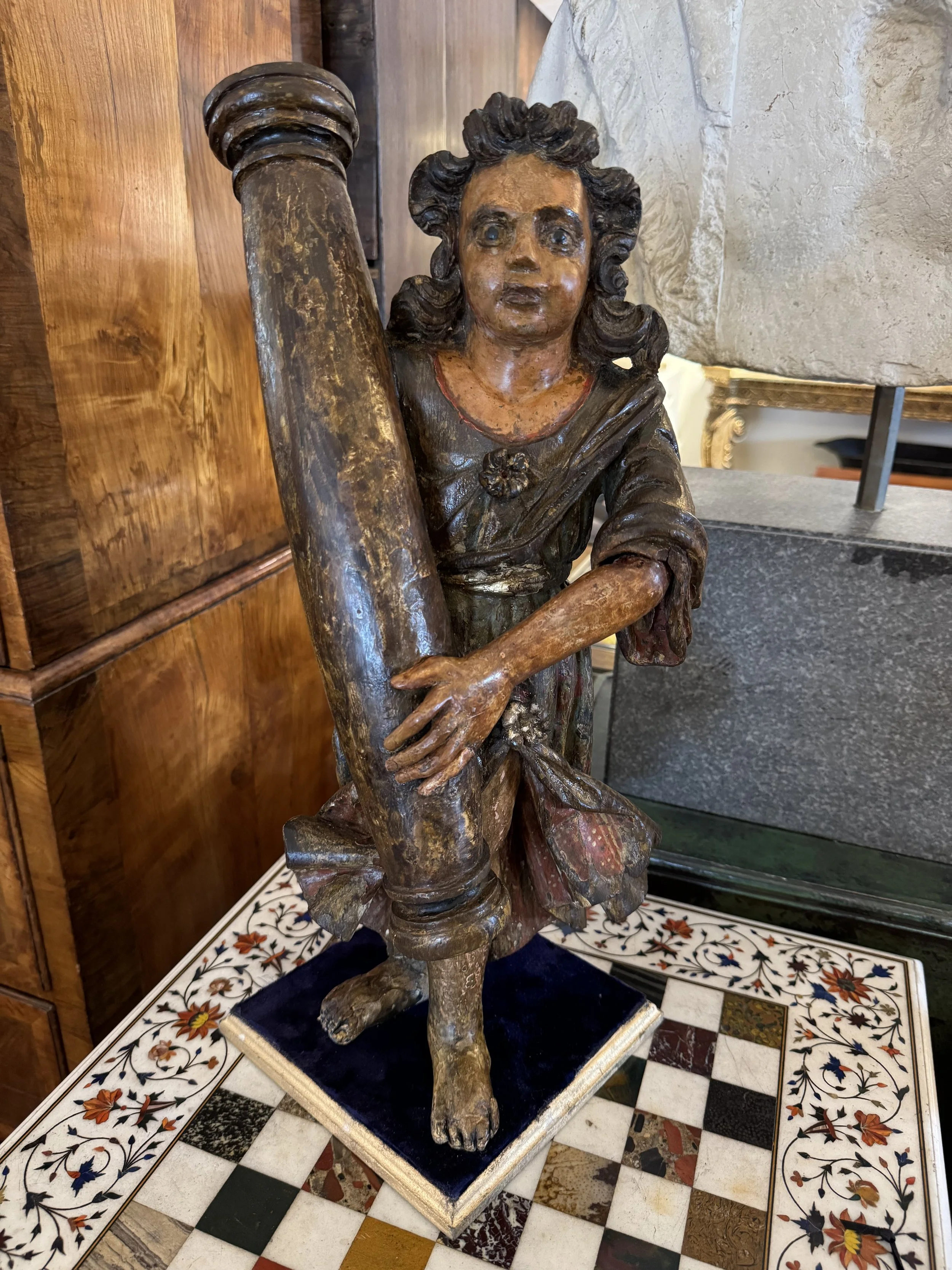 This is a picture of a wonderful 18th century carved and polychrome wood figure of Saint Simeon Stylites.