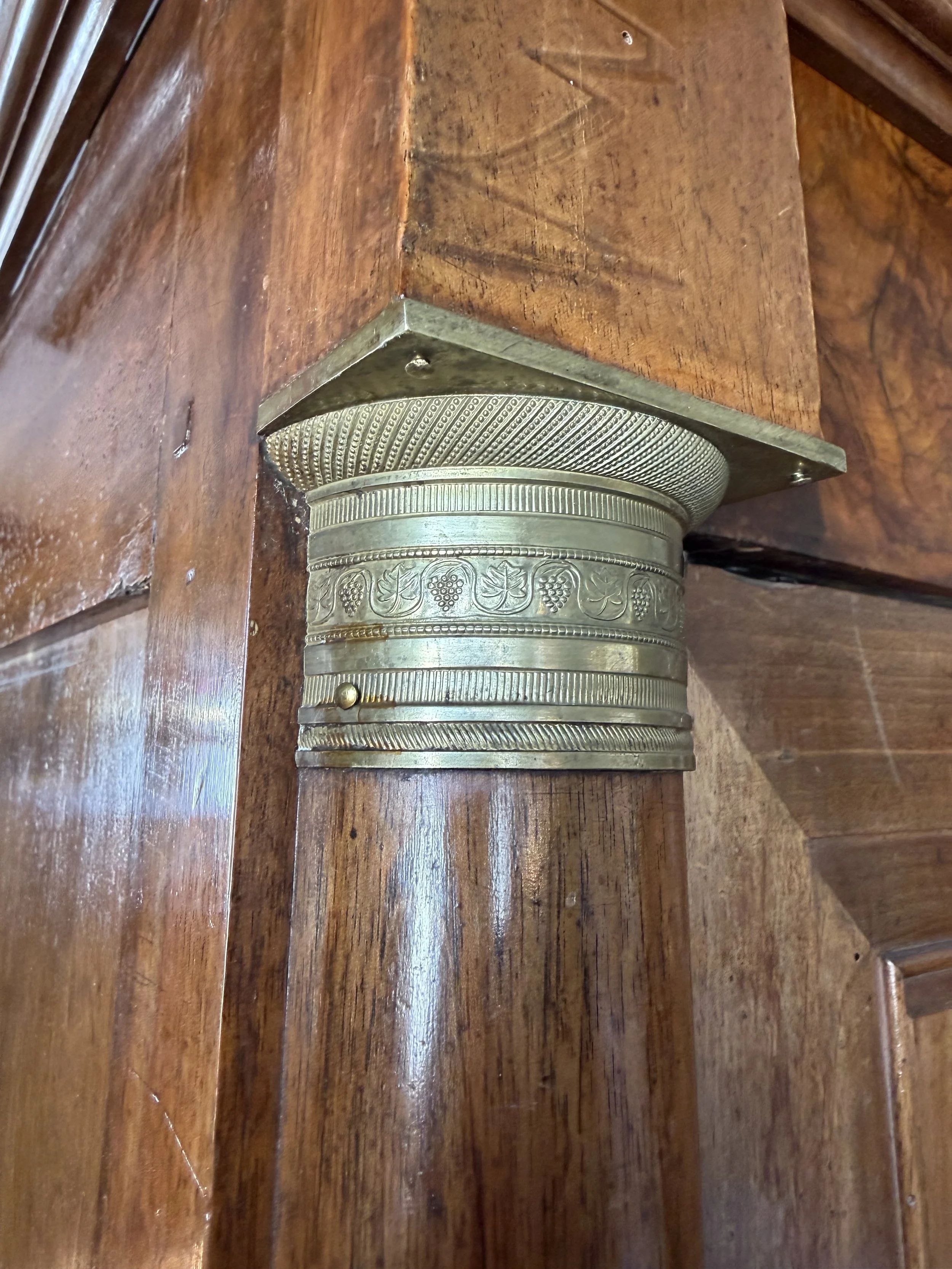 This is a picture of a fabulous French Empire walnut cupboard c1830 with the most beautiful colour and original hardware.