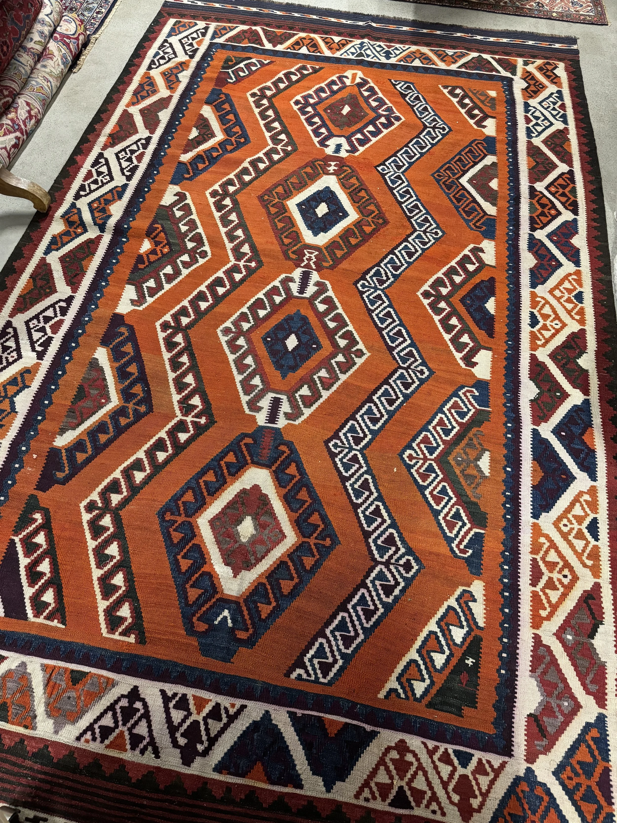 This is a picture of a hand woven wool on wool antique kilim from Shiraz c1900.