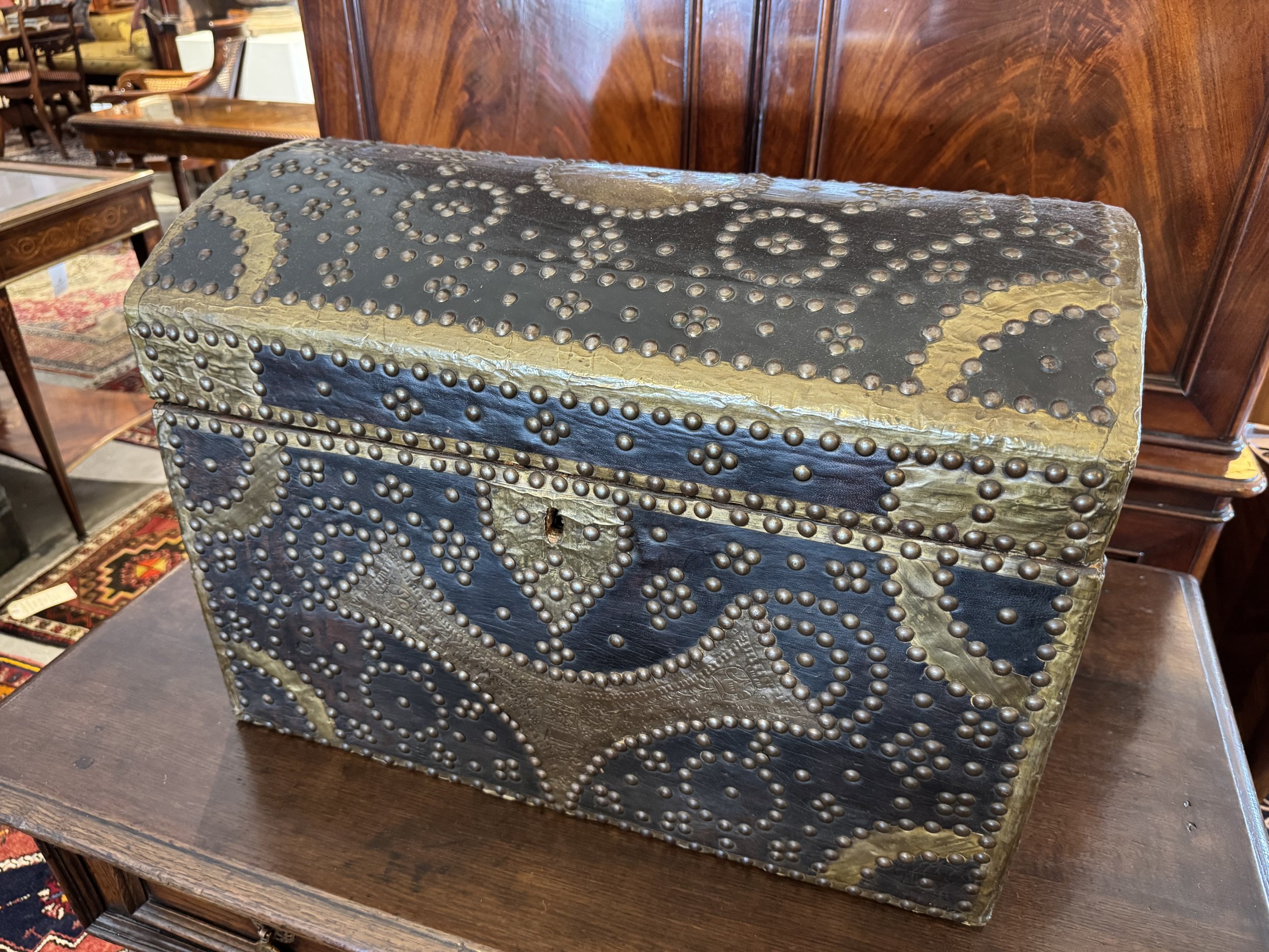 brass studded trunk