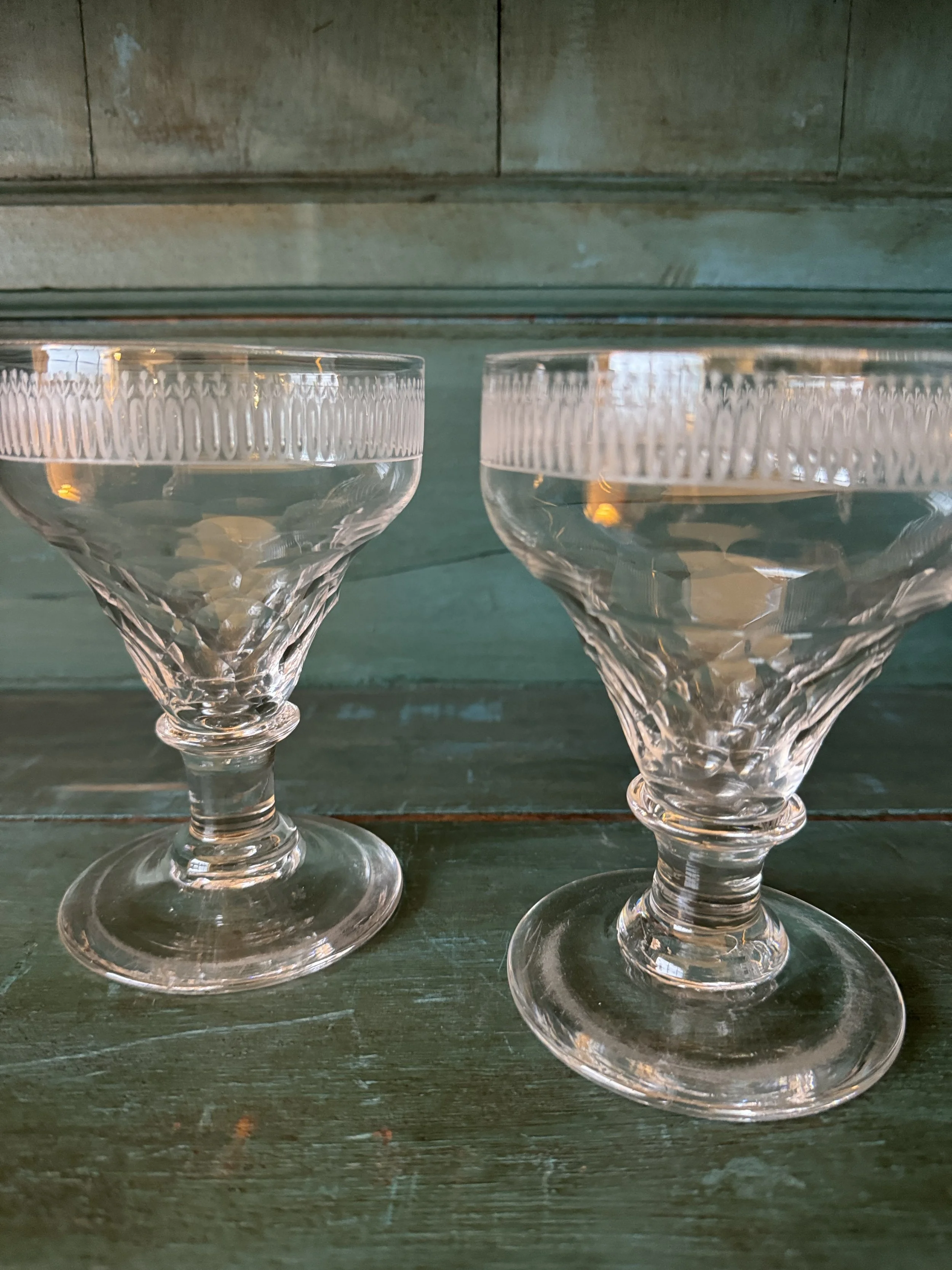 This is a picture of a very lovely pair of cut and engraved ovoid glass rummers c1830.