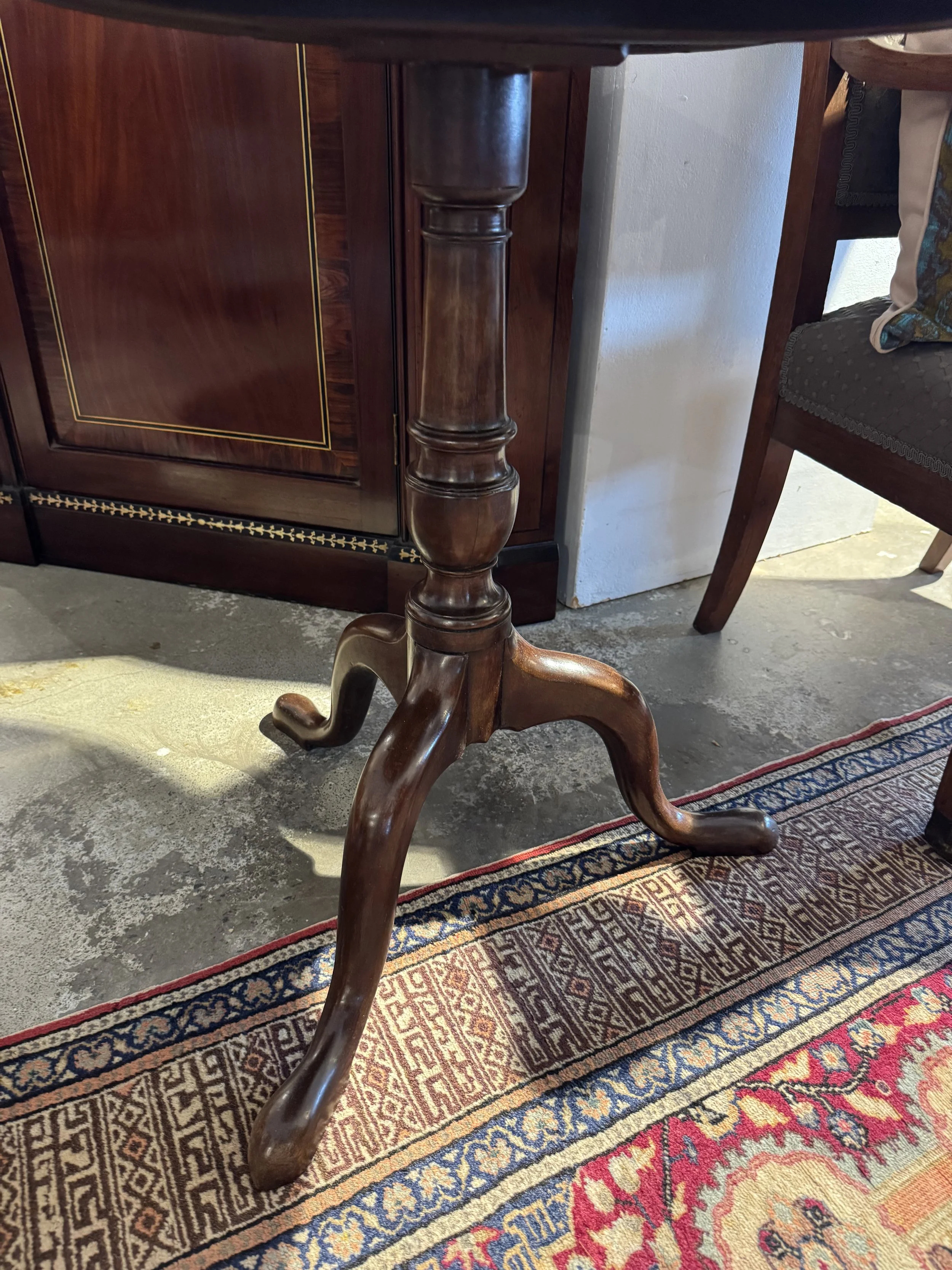 This is a picture of a very elegant George III period mahogany tilt top wine table c1780.